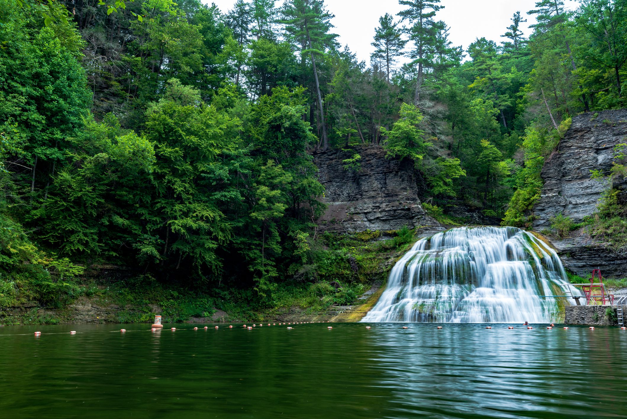 Lower Enfield Falls, Robert H. Treman State Park, Ithaca, New York, waterfalls with swimming hole and trees surrounding