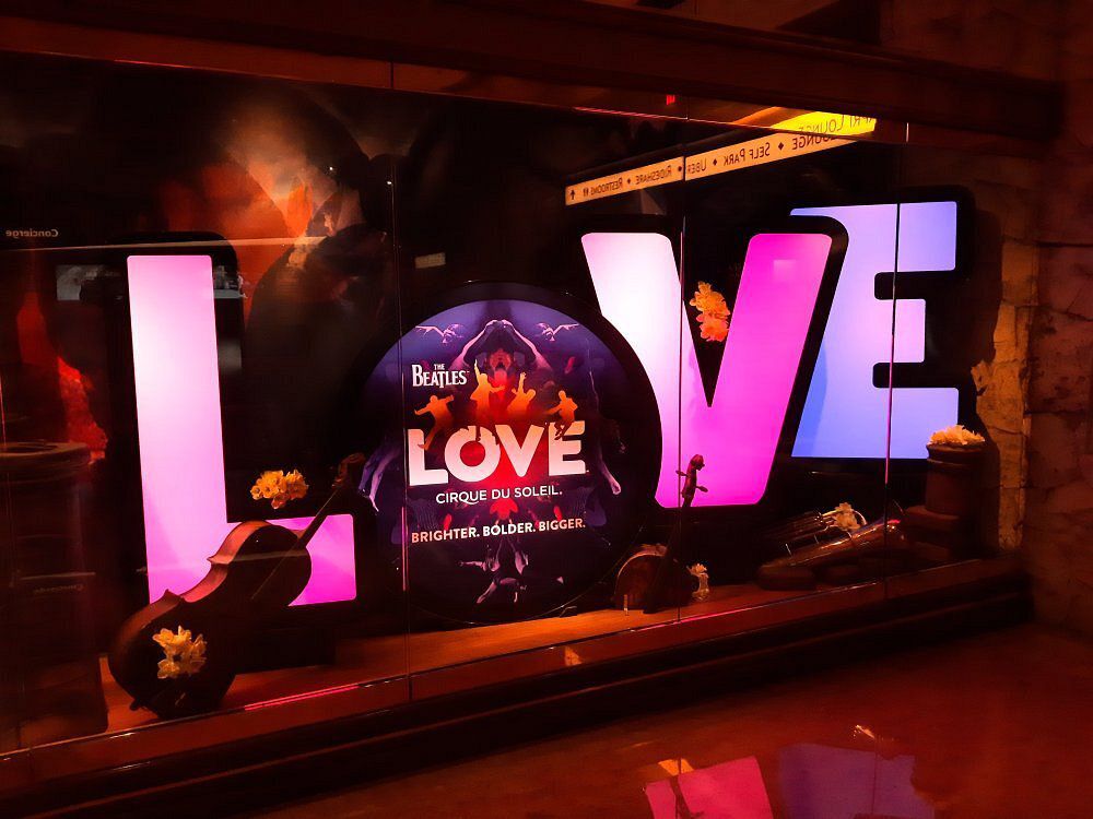 ‘The Beatles LOVE’ by Cirque du Soleil neon sign
