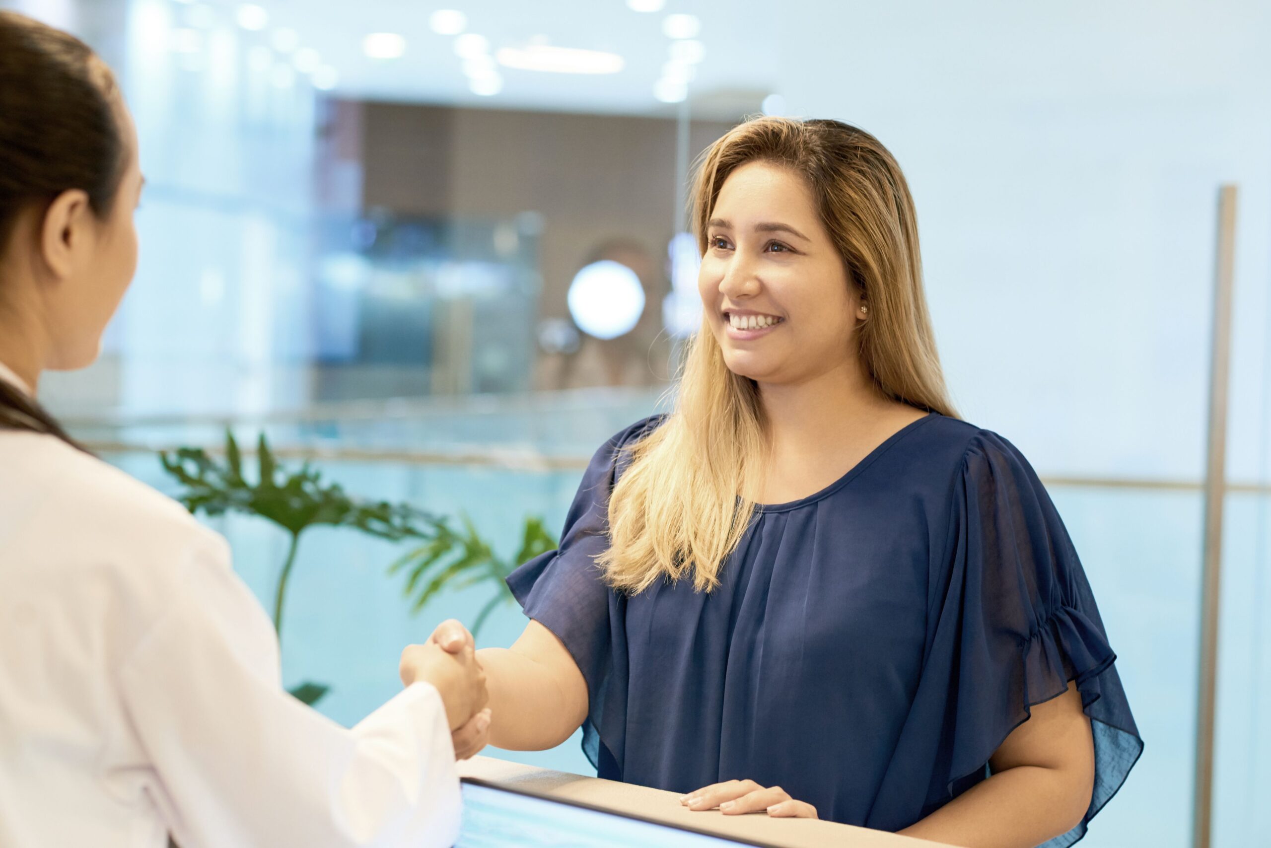 shaking hands with receptionist