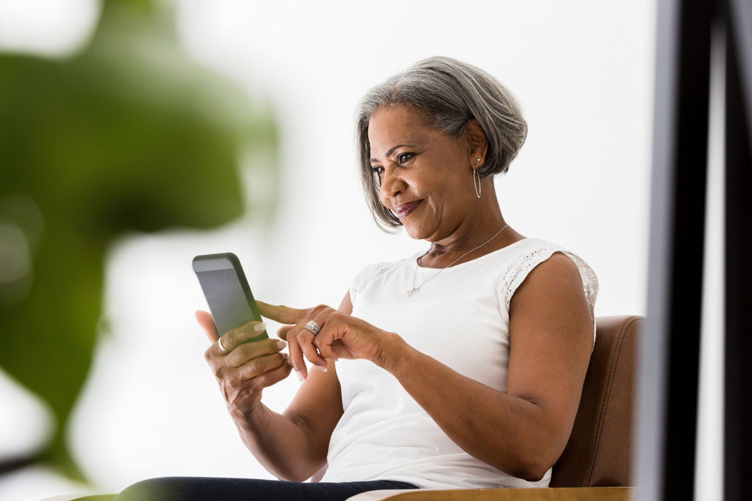 woman scrolling on phone