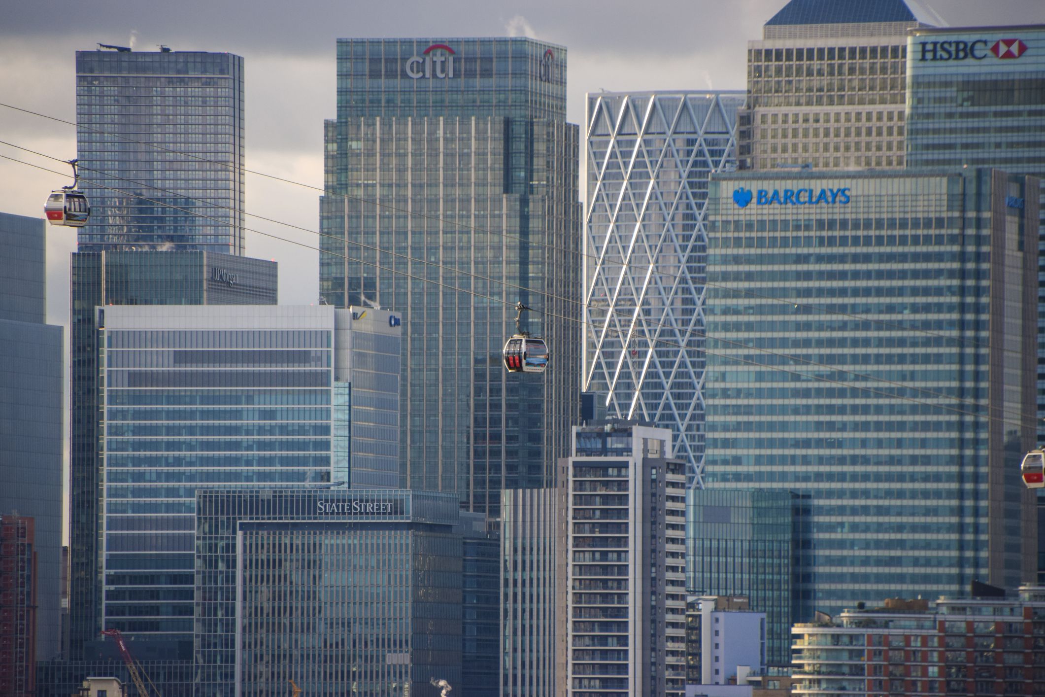 London, United Kingdom - January 2 2021: daytime view of Canary Wharf corporate buildings and skyscrapers,