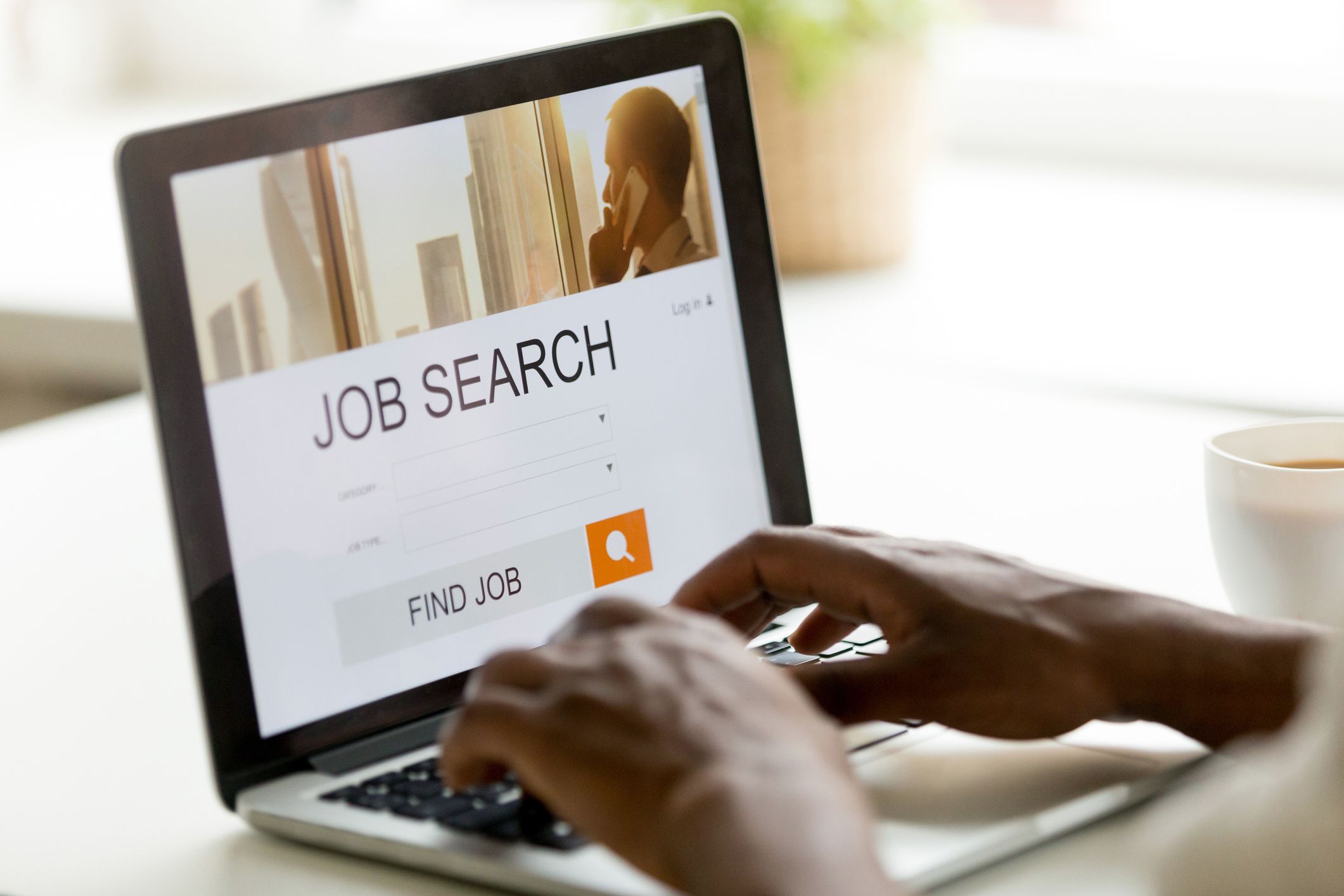 laptop with job search website on screen