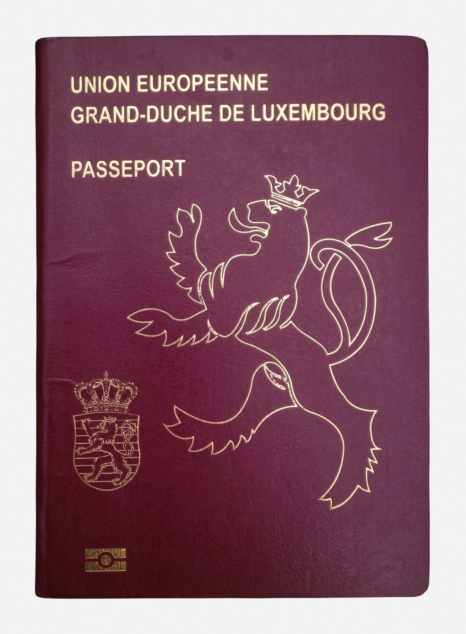 Close-up on a Luxembourg passport isolated on a white background.