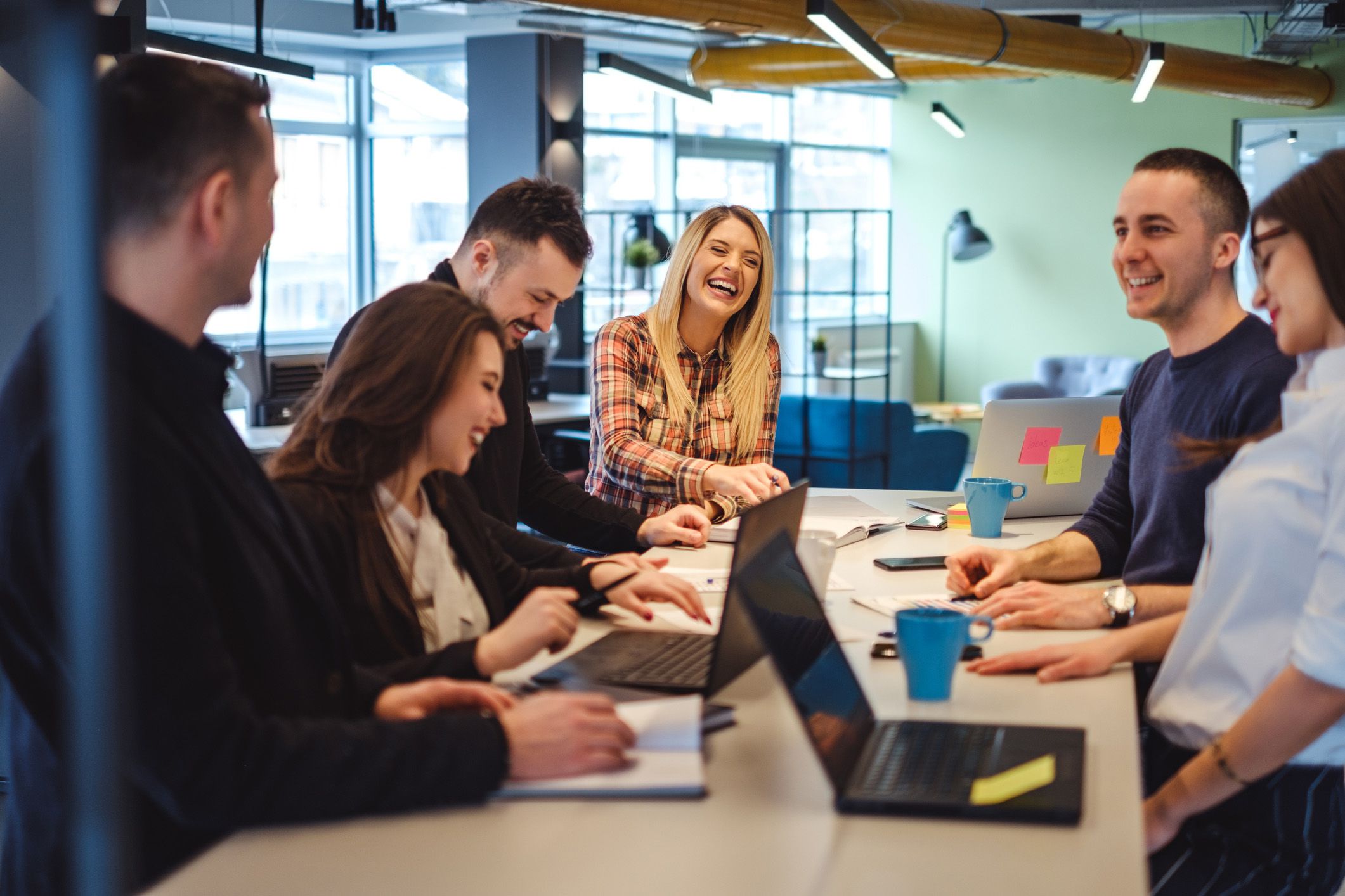 group of employees working together at office