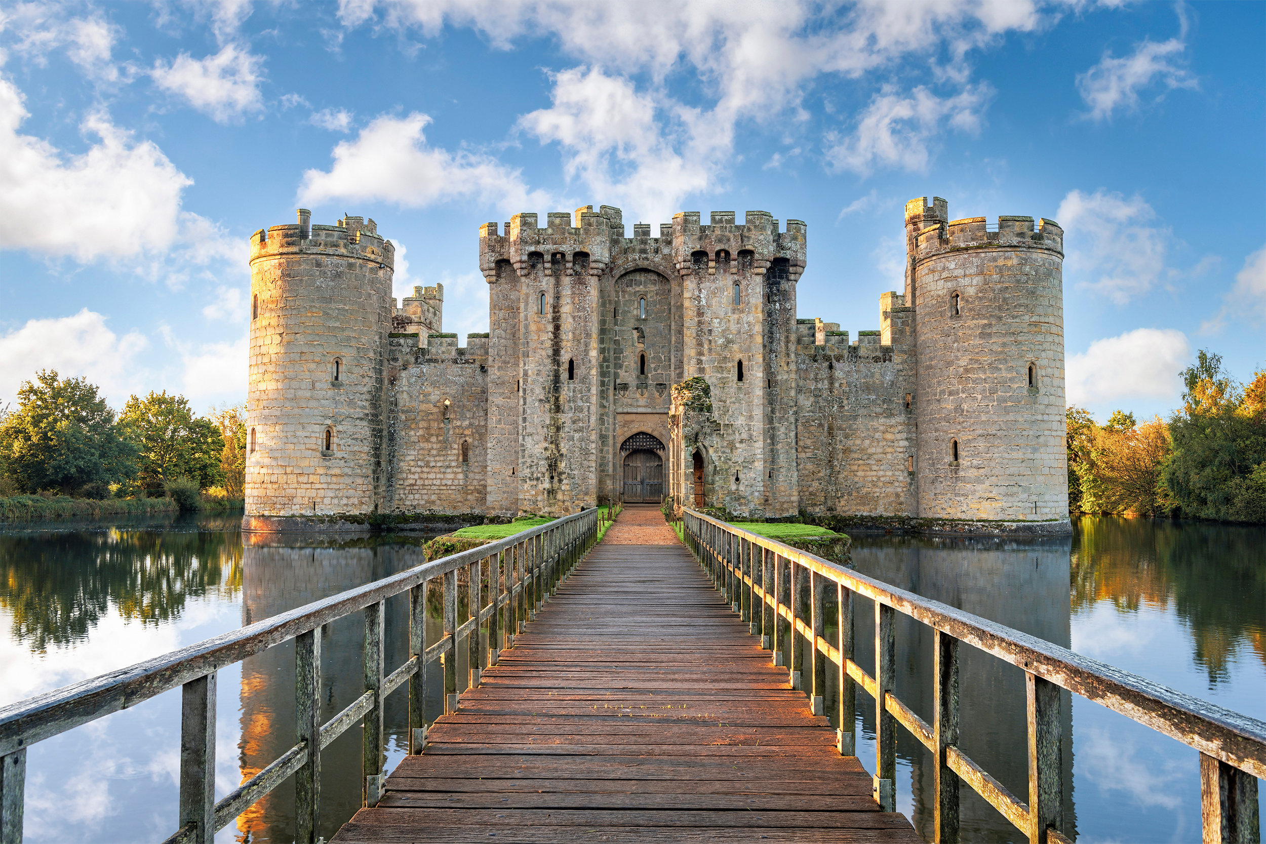 Front view of Bodiam Castle in England from bridge across moat