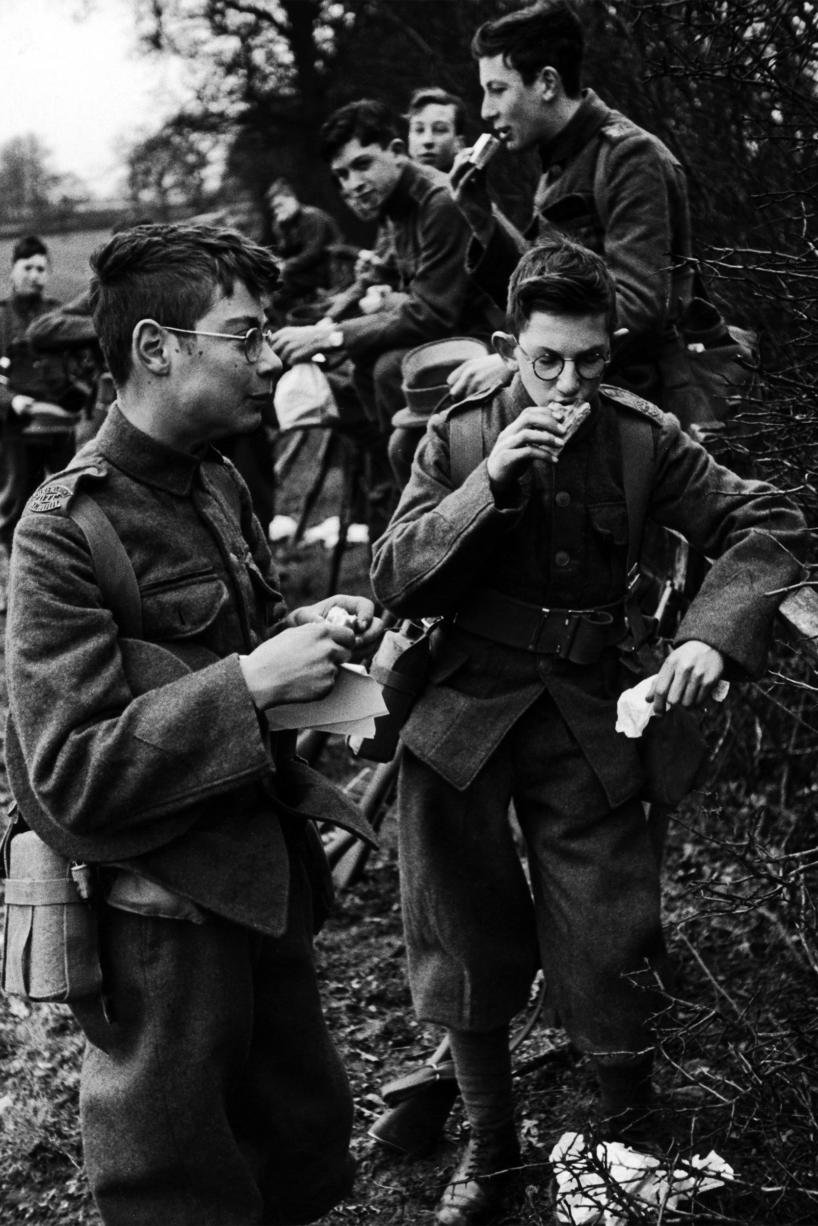 Members of the Shrewsbury public school O.T.C. (Officers Training Corps) stop for sandwiches during a day of field exercises