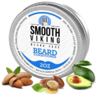 A tin of Smooth Viking Beard Conditioner (2 oz) is shown with illustrations of almonds, an avocado, and a shea nut in front, suggesting natural ingredients.
