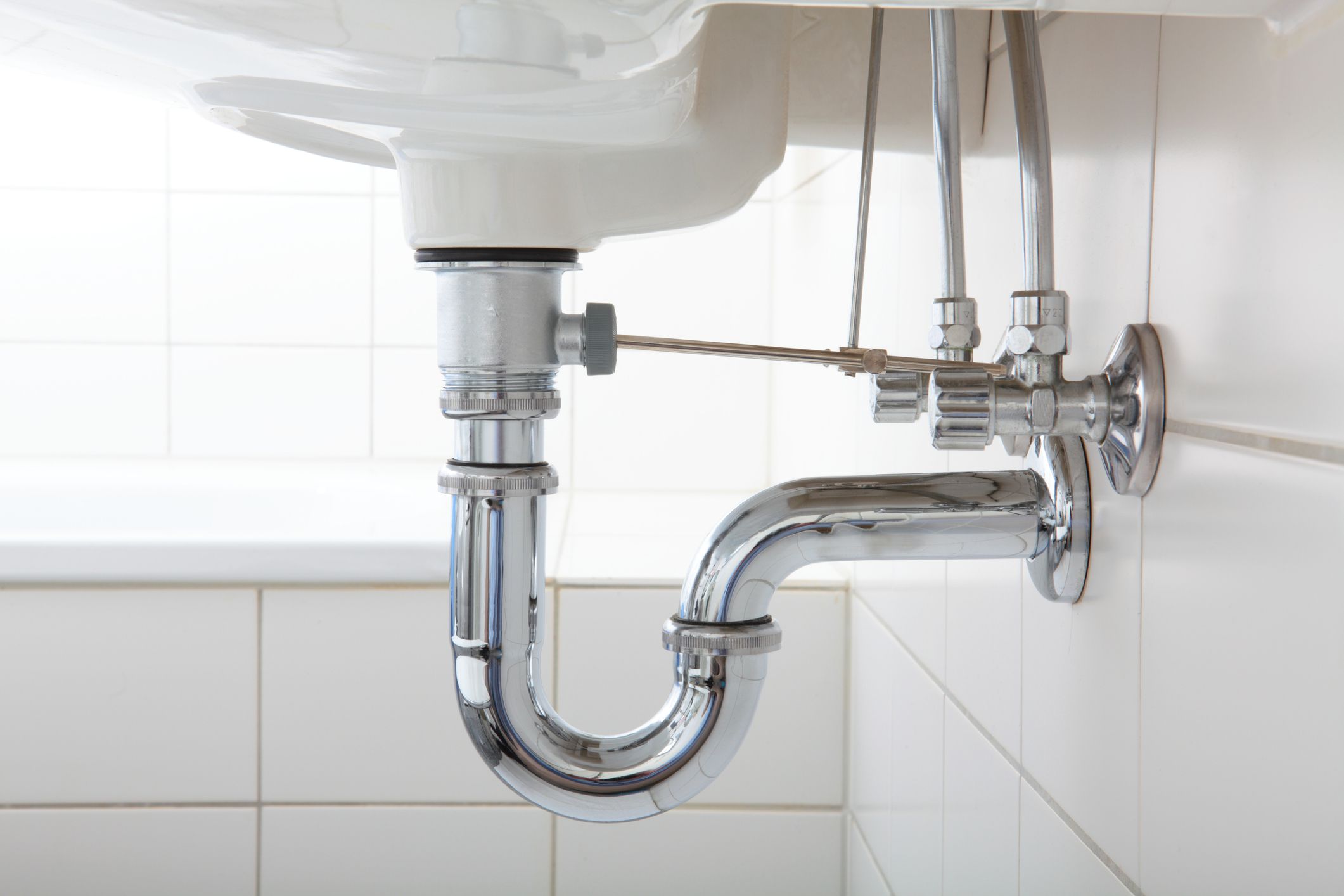 Sink pipe under wash basin in white bathroom /// PLEASE CLICK HERE FOR MORE PICS: