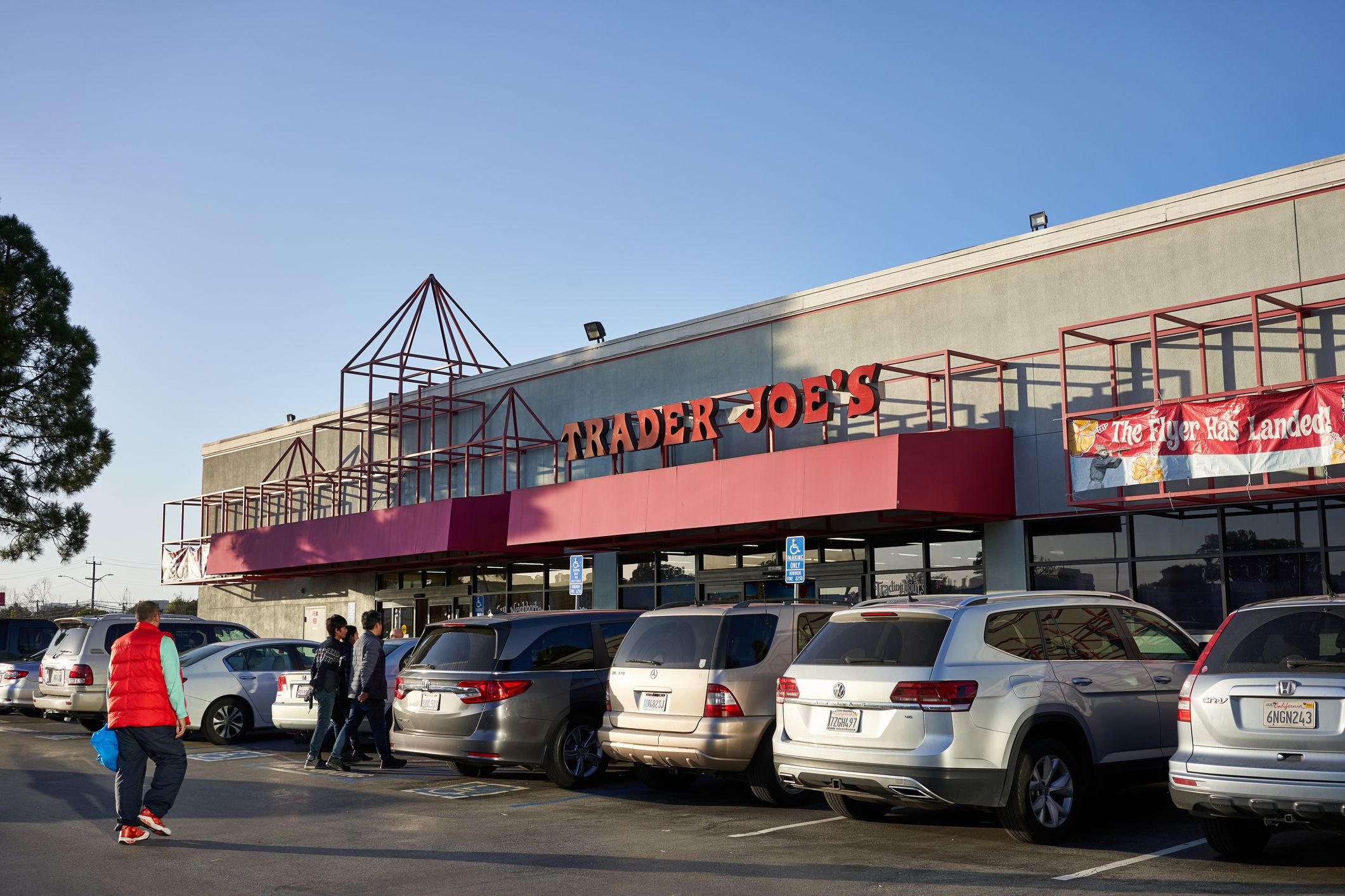 San Mateo, CA, USA - Feb 8, 2020: Shoppers entering a Trader Joe's grocery store in San Mateo, California.