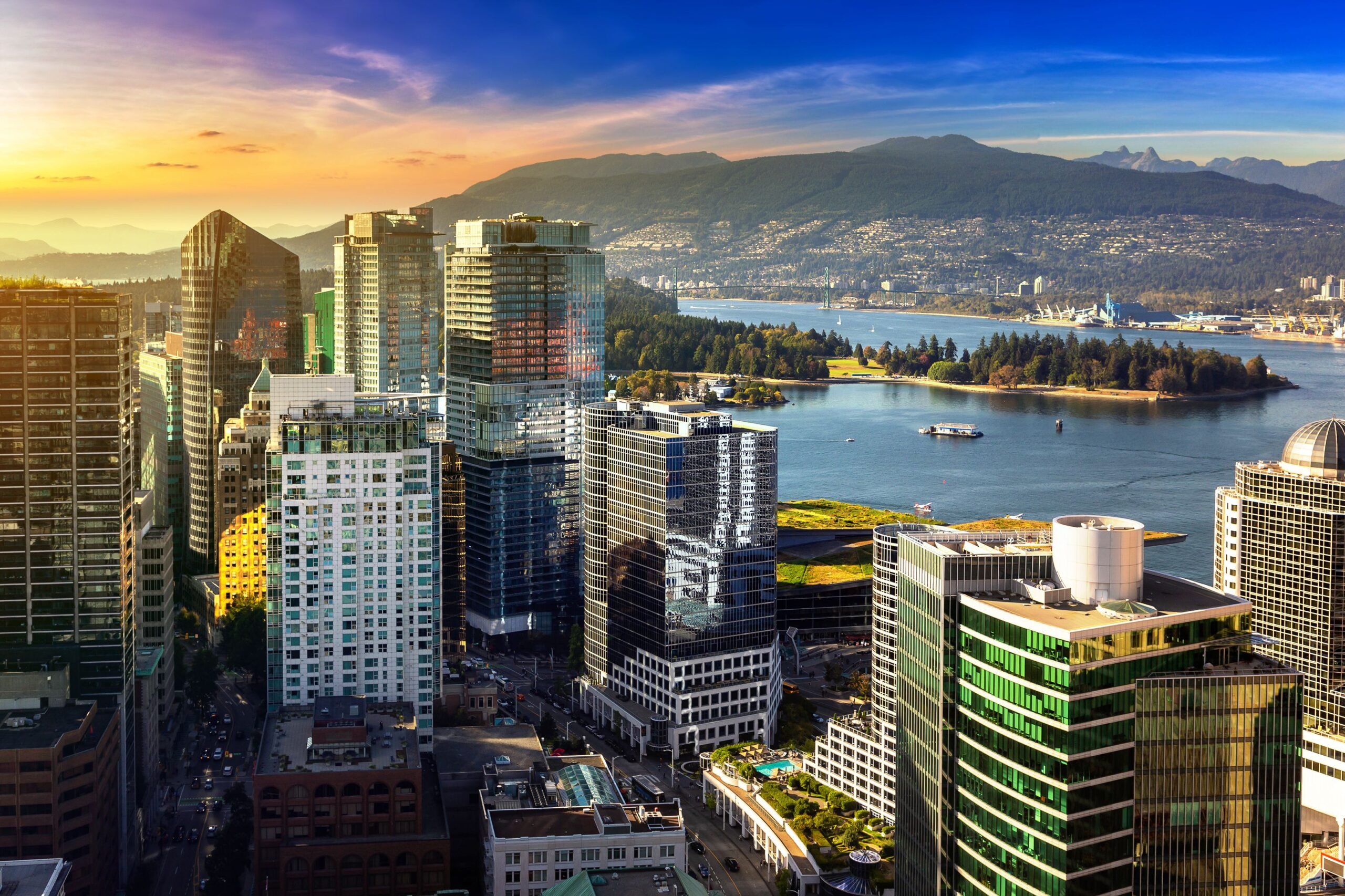 Panoramic aerial view of Vancouver business district at sunset, Canada