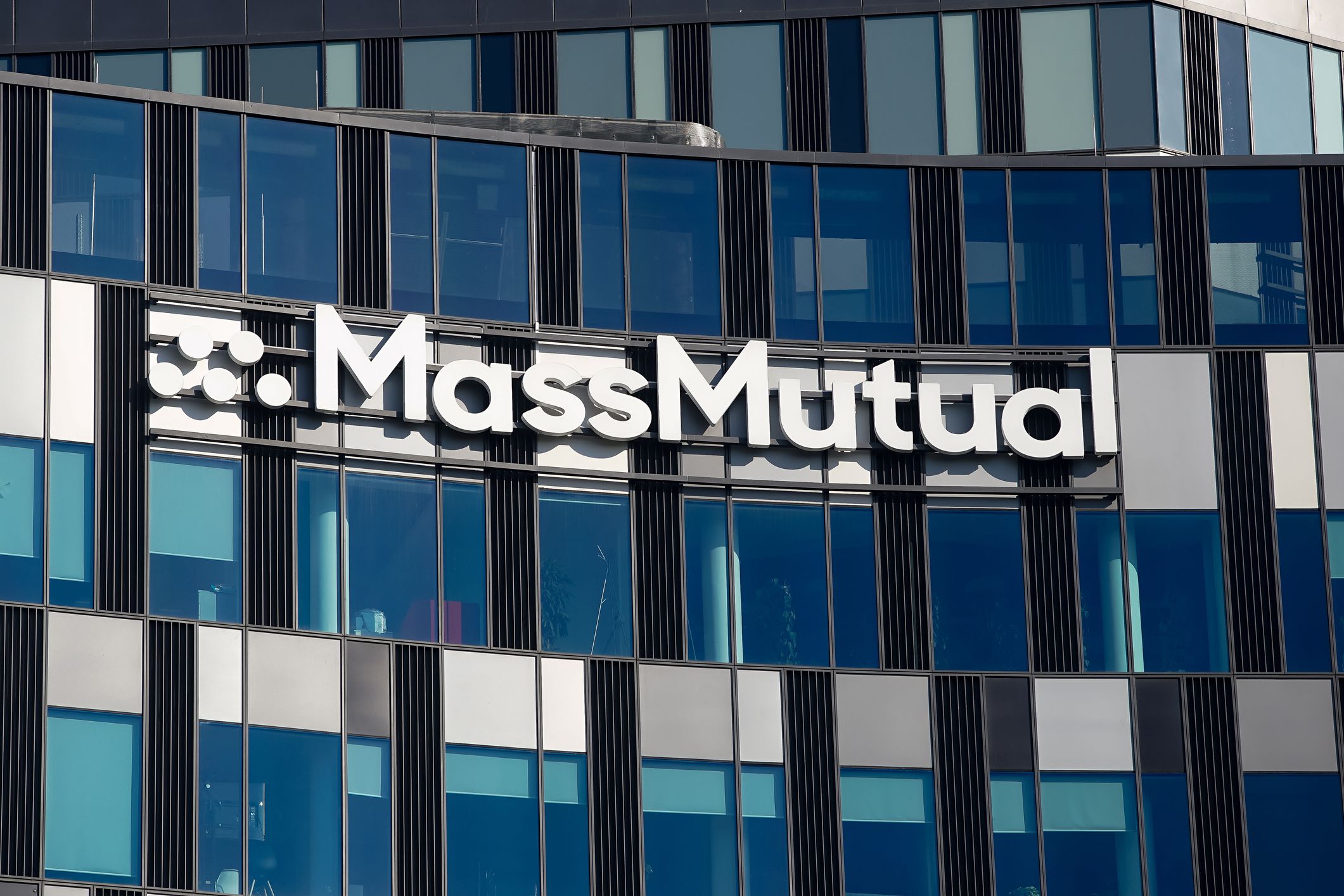 Bucharest, Romania - October 04, 2021: The logo of Life Insurance Company MassMutual is seen on top of its headquarter building, in Bucharest.
