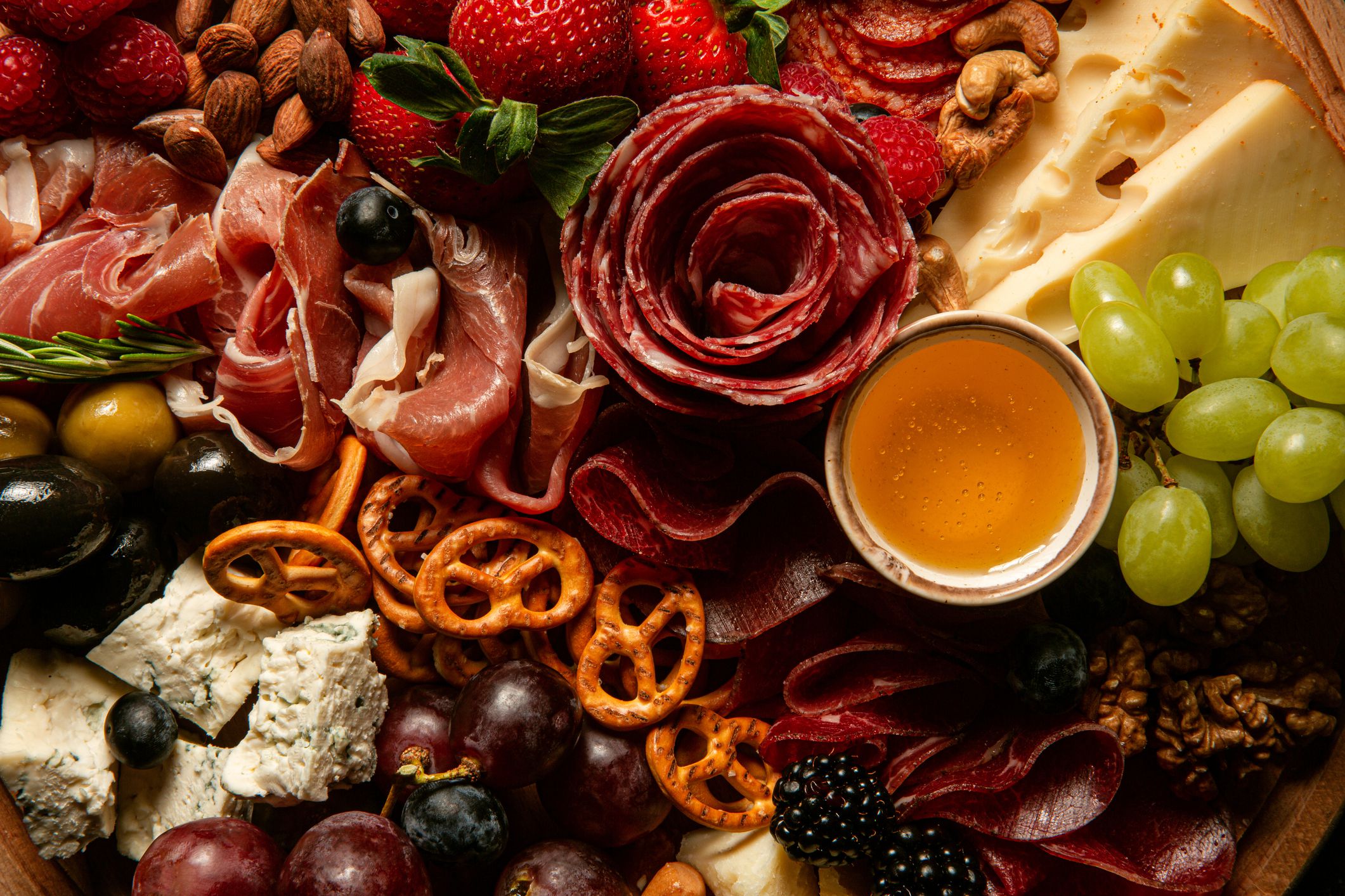 Delicious appetizer. Variety of cheeses, salami, prosciutto, nuts ans fruits.