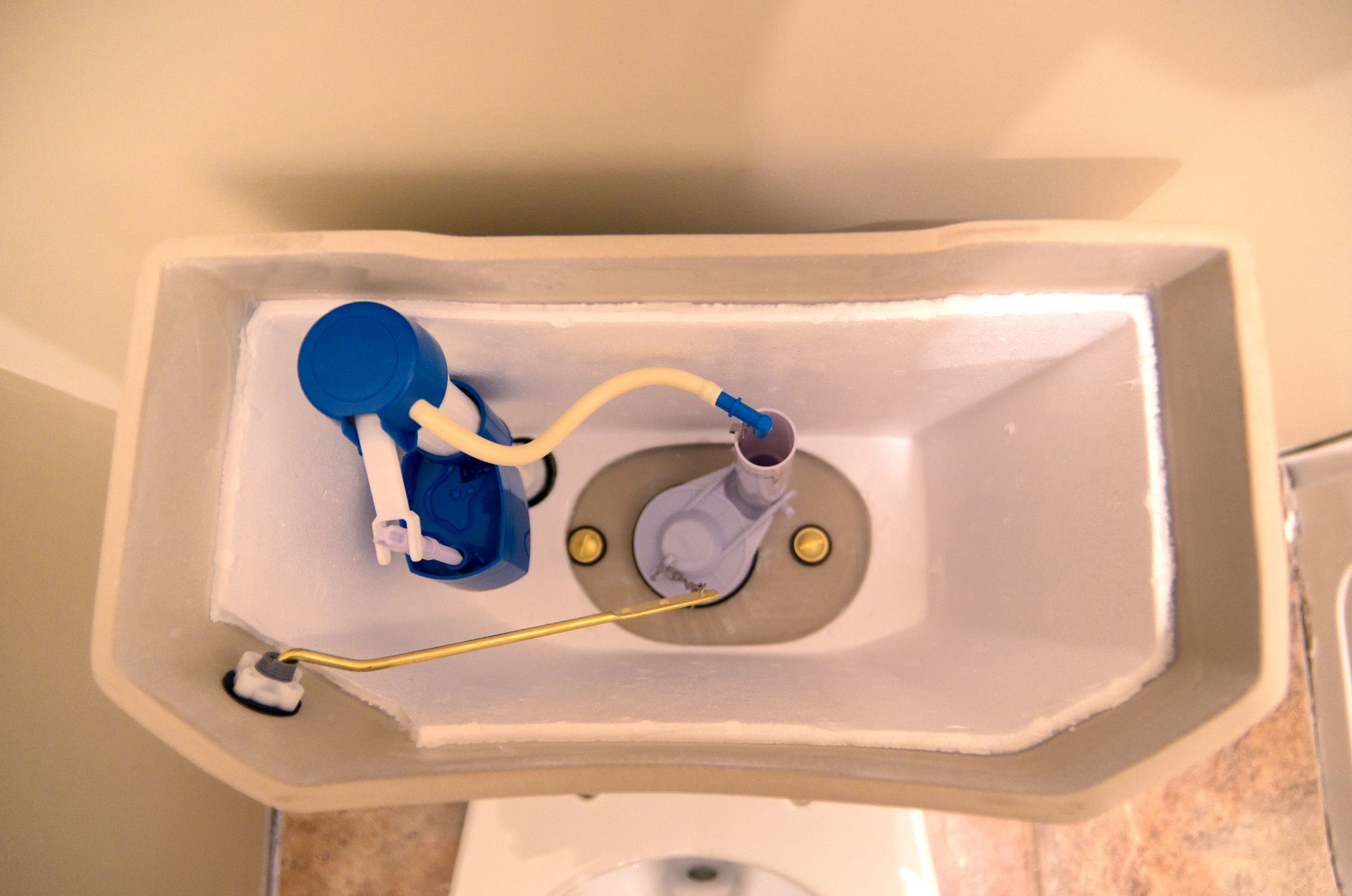Overhead view of a brand new insulated toilet tank during new house construction.