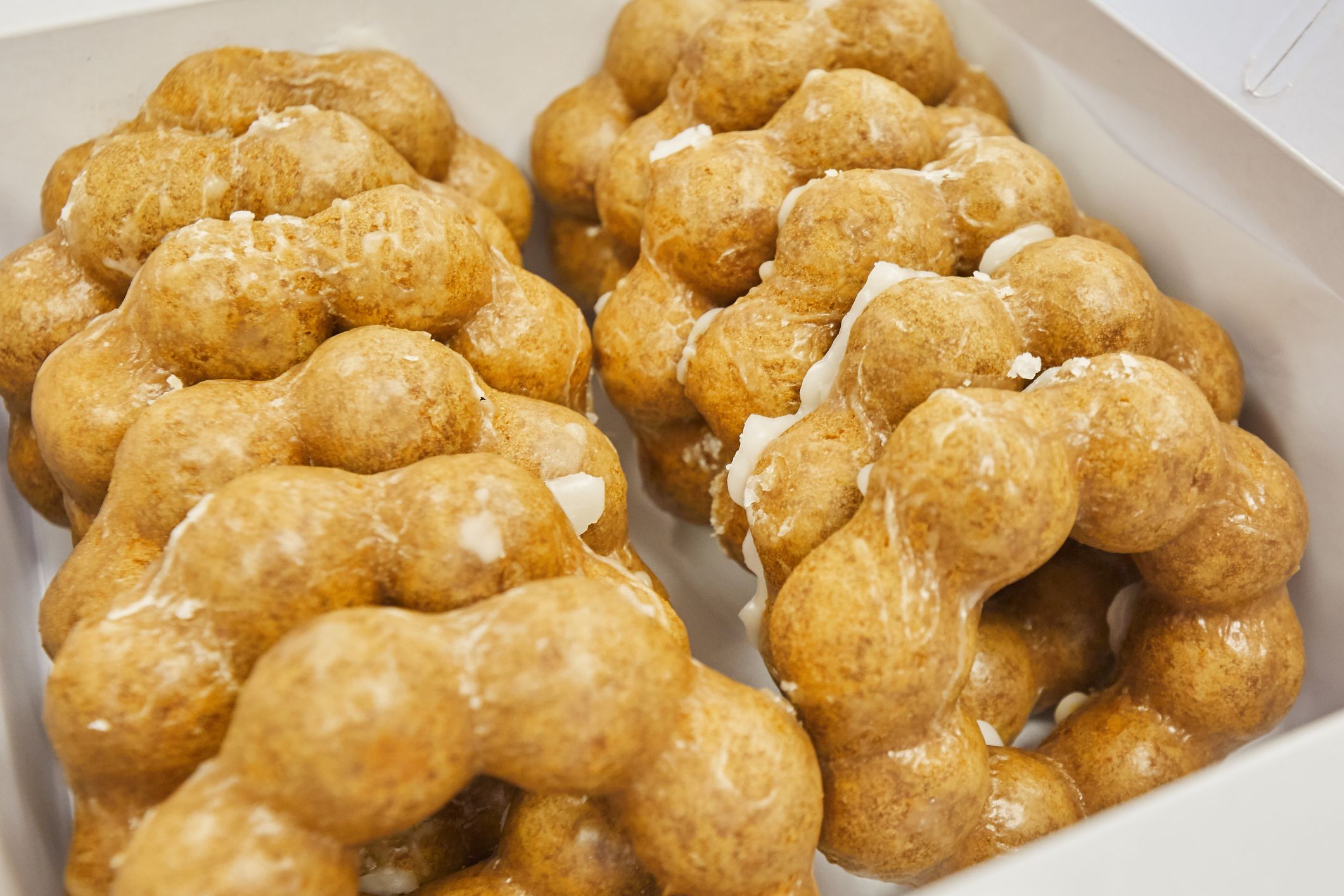Poi Mochi donuts are similar to the ring doughnuts and it is made with Poi from Taro plant. The taste is very sweet and chewy and covered with white crisp crust.