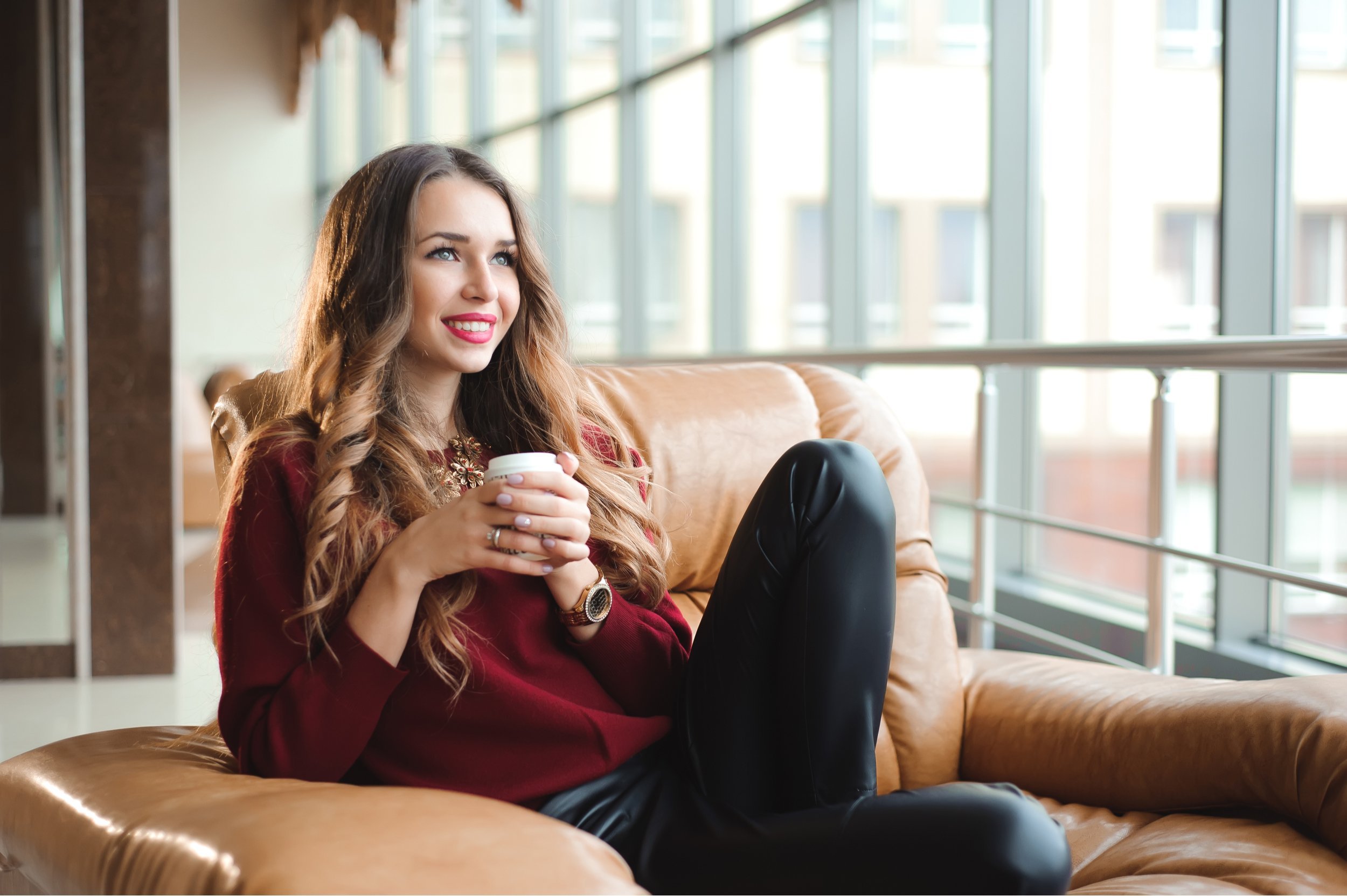 attractive businesswoman have a coffee break in airport