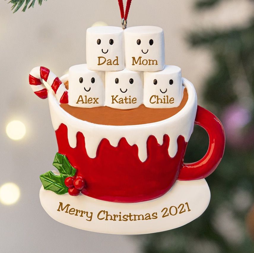 Cute personalized Christmas ornament with marshmallows on a cup of hot cocoa