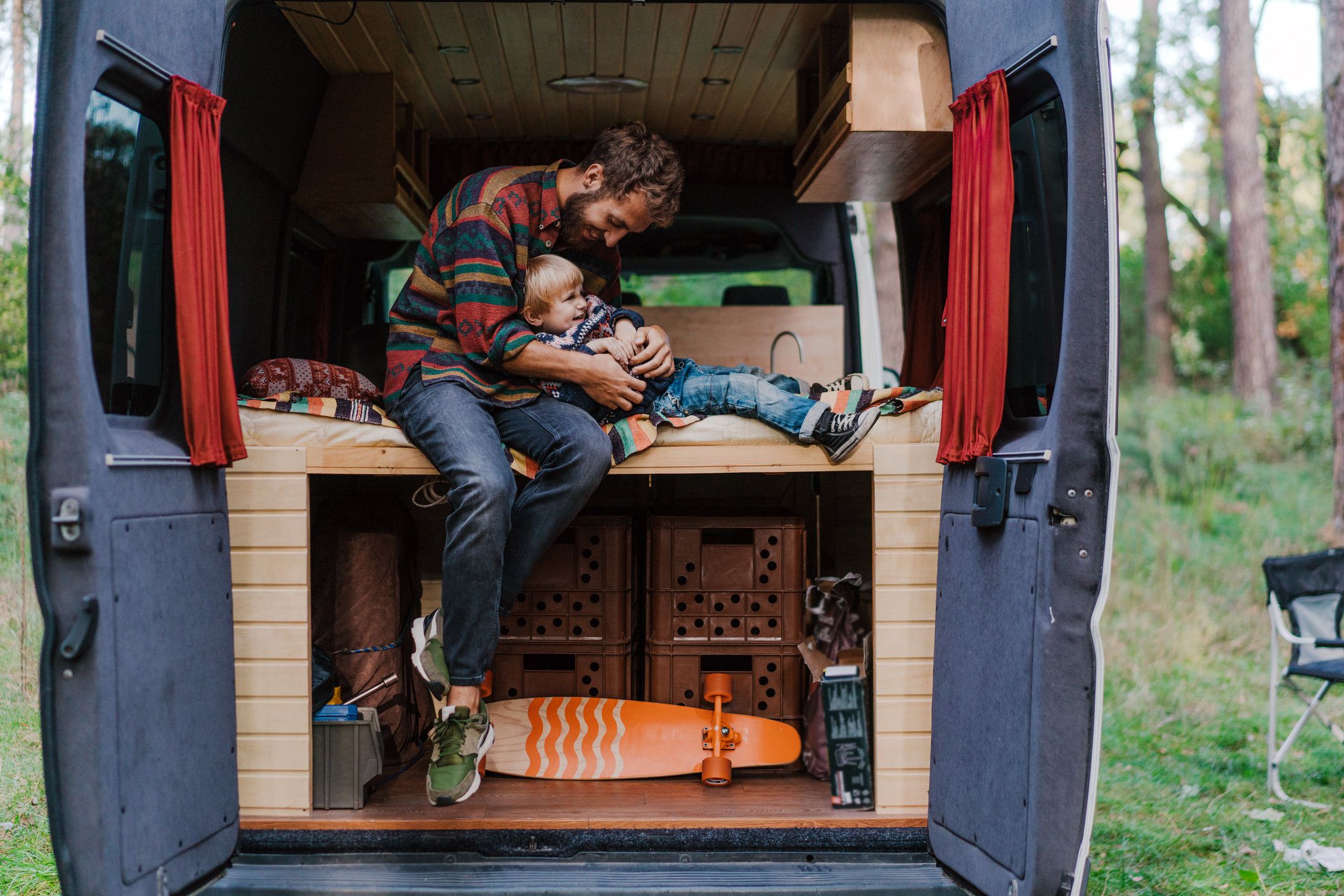 man and child in rv
