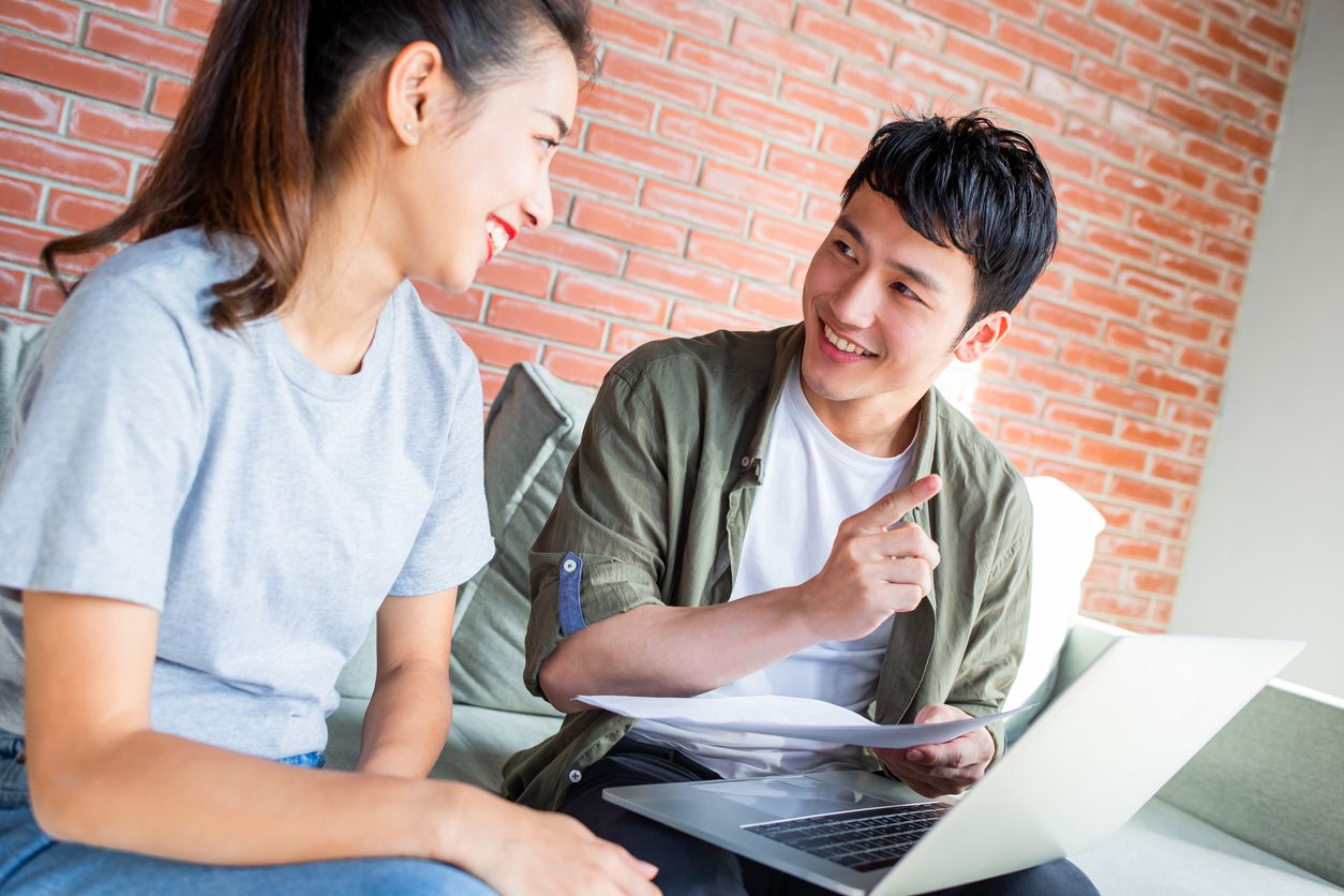 young couple discuss finances