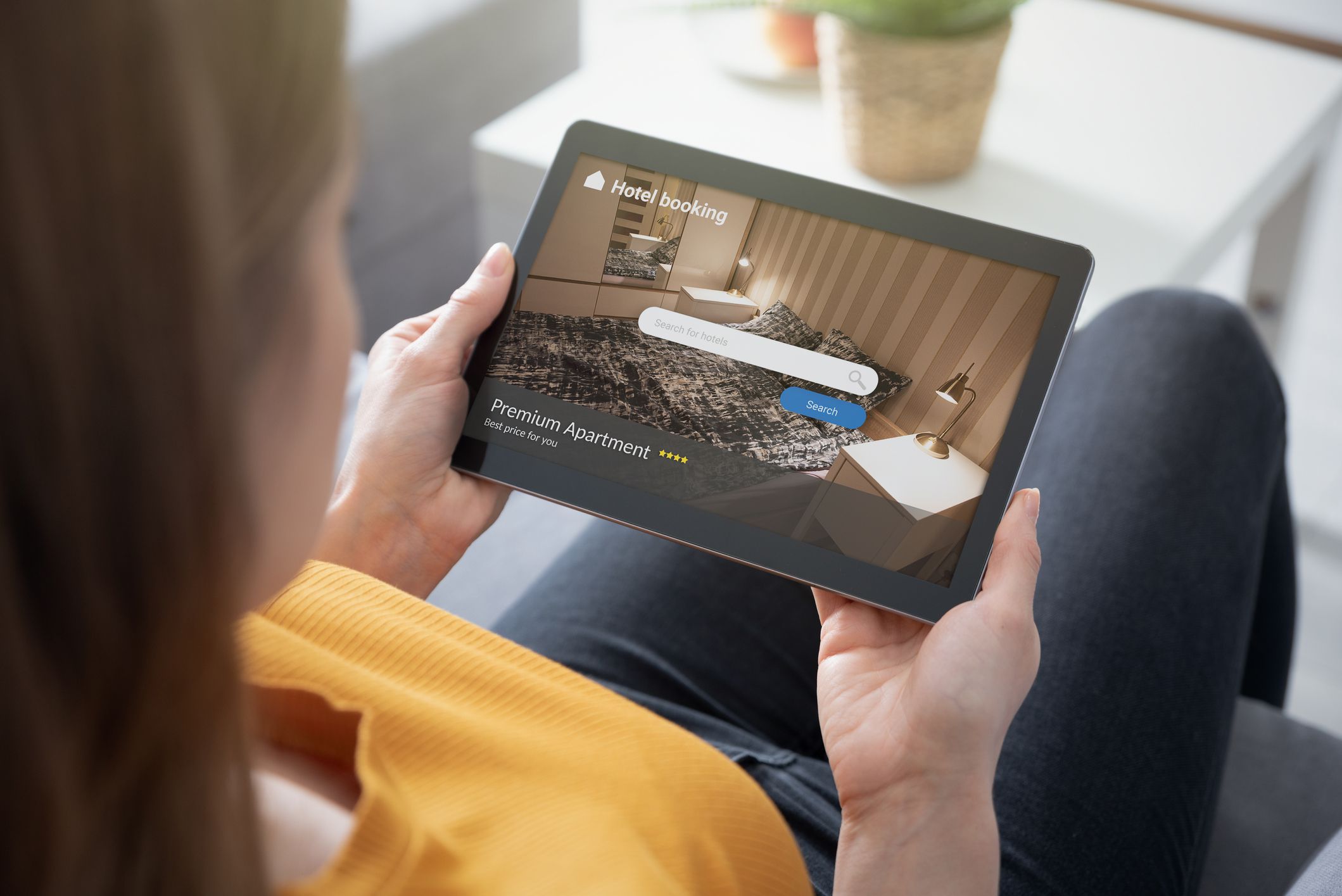 Woman makes hotel reservations via the internet. Tourism, vacation concept