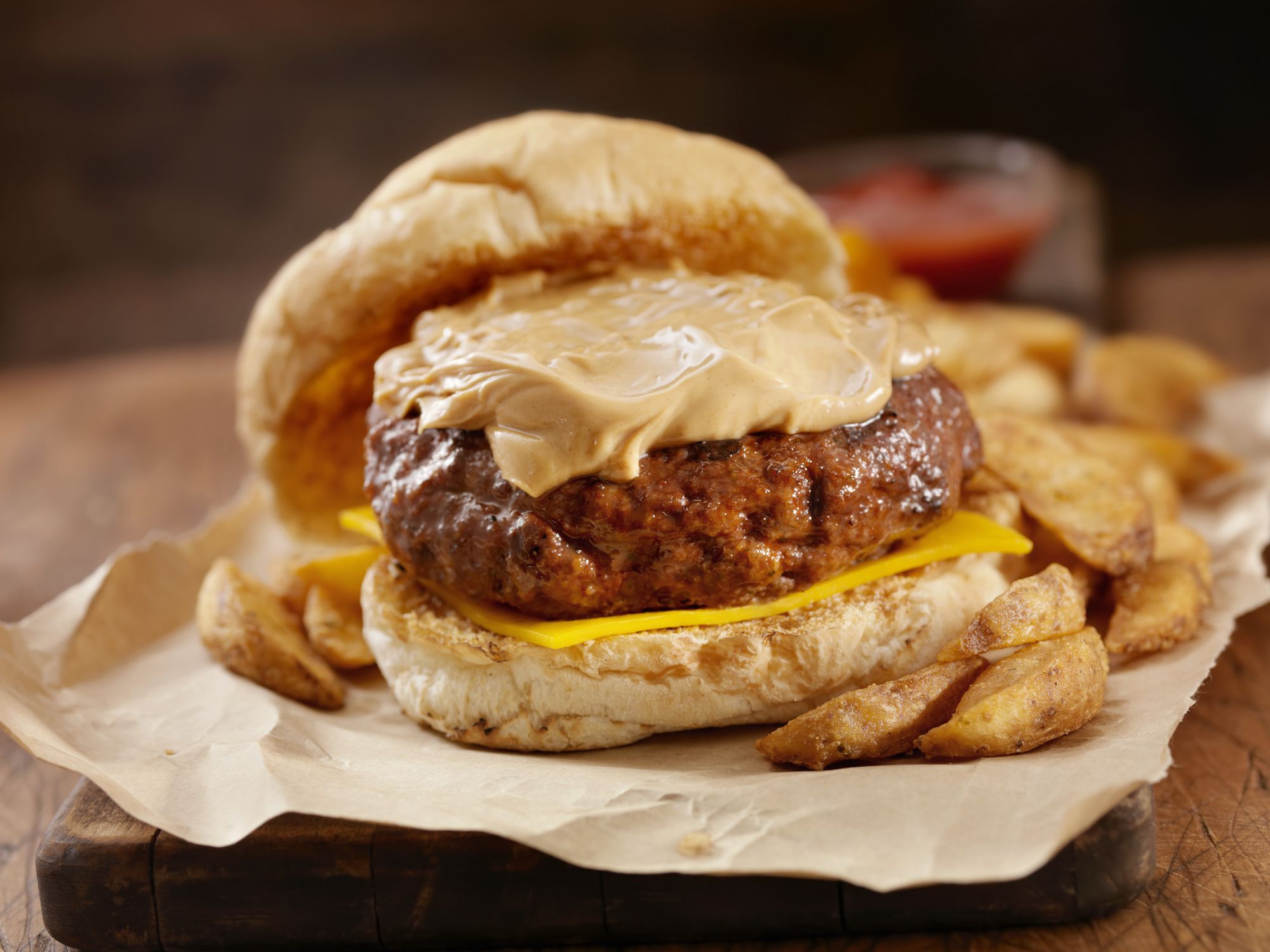 Peanut Butter Bacon Burger on a toasted Kaiser Bun with Wedge cut French Fries-Photographed on Hasselblad H3D-39mb Camera