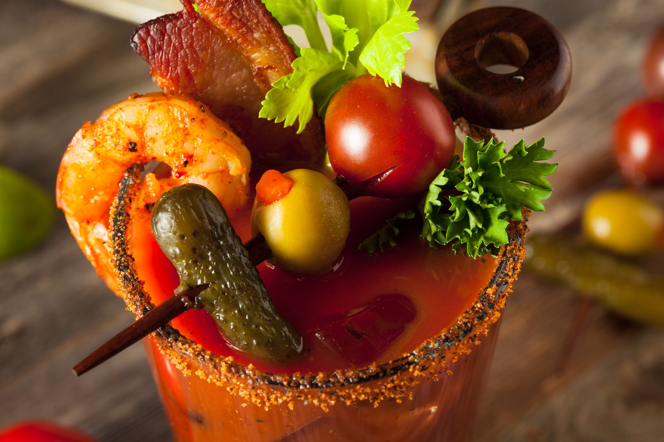 Homemade Bacon Spicy Vodka Bloody Mary with Tomatos, Olive and Celery