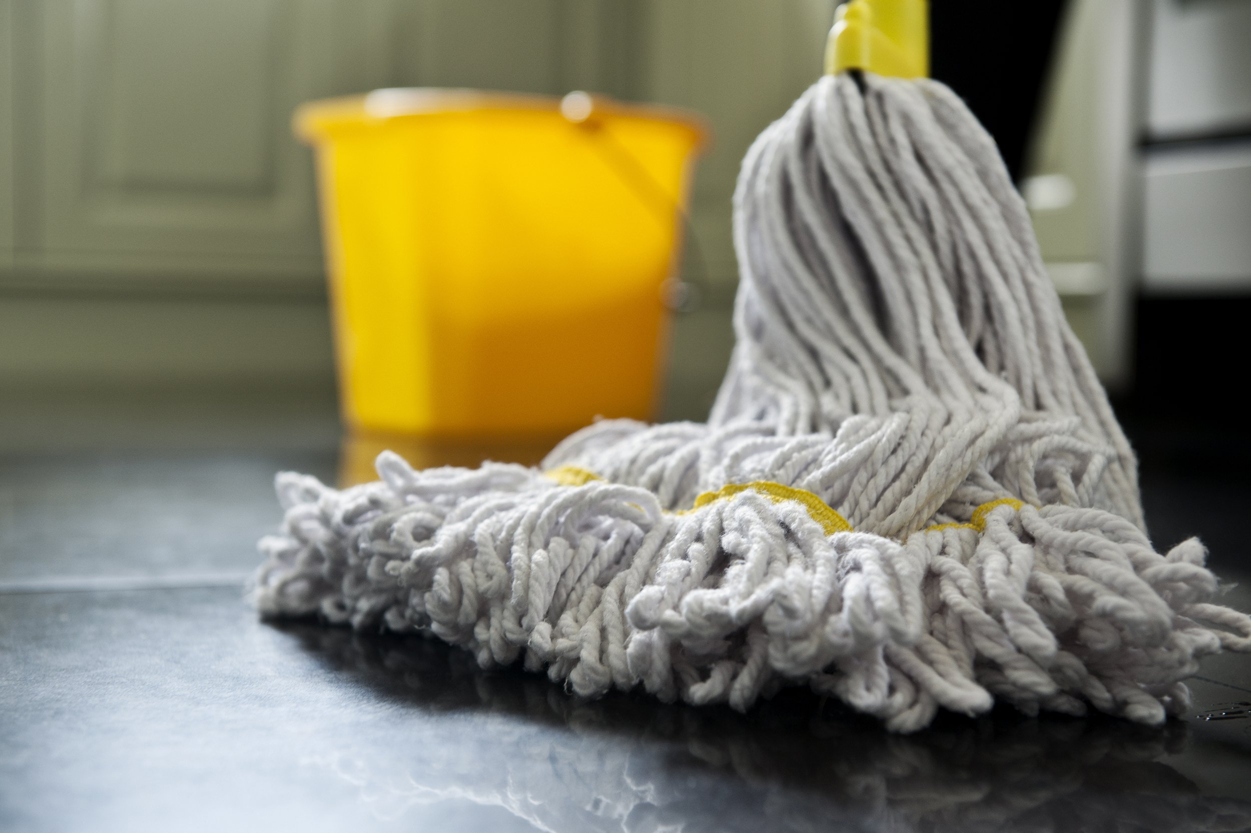 mop on floor with bucket