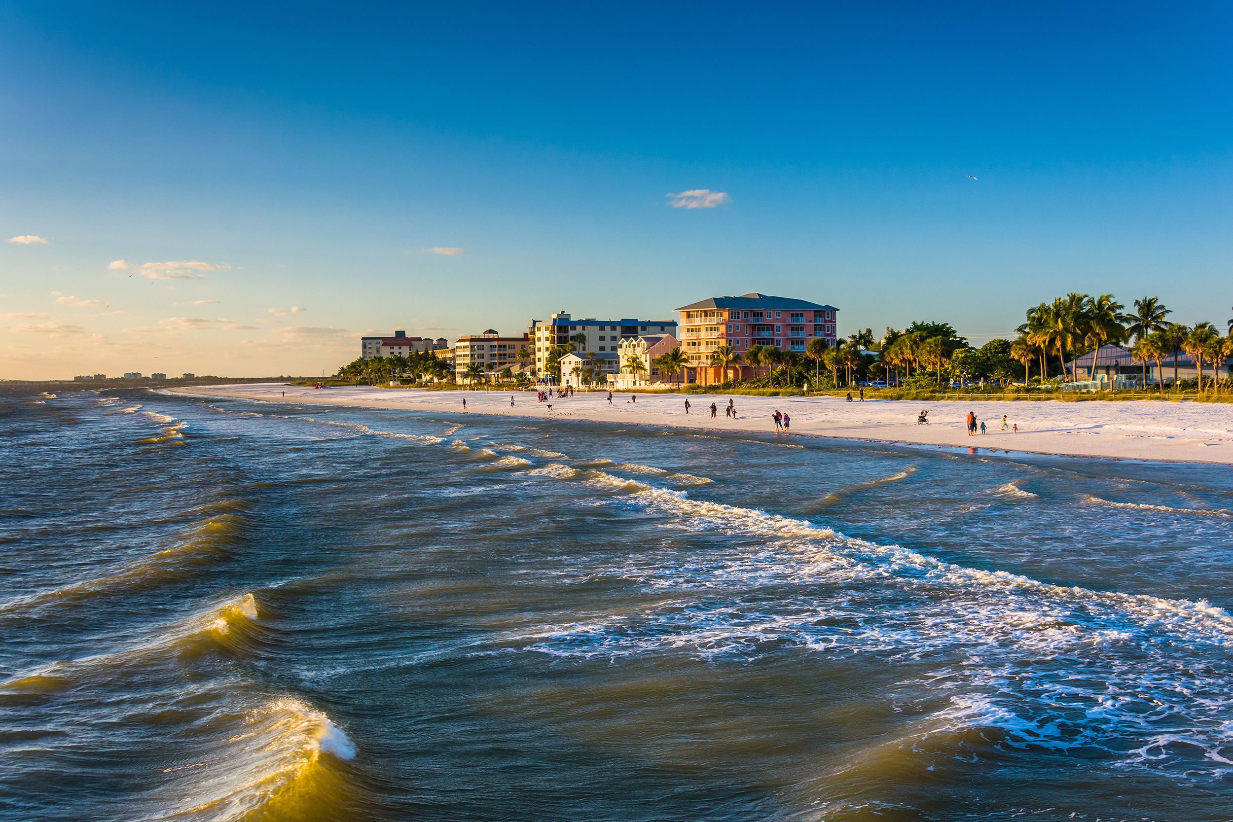 Sunset on beach, view from water, in Fort Myers, FL