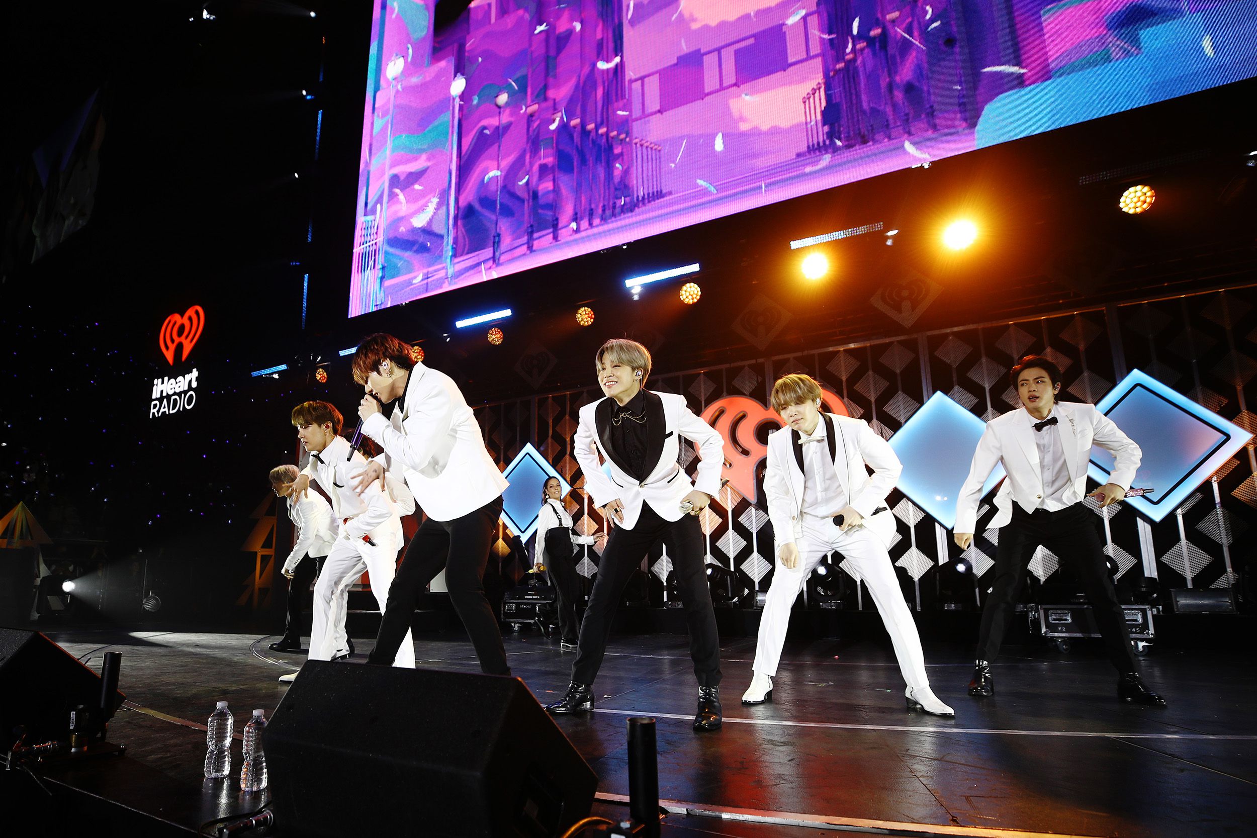 bts perform onstage during 102.7 kiis fm's jingle ball 2019 presented by capital one at the forum on december 6, 2019 in los angeles, california