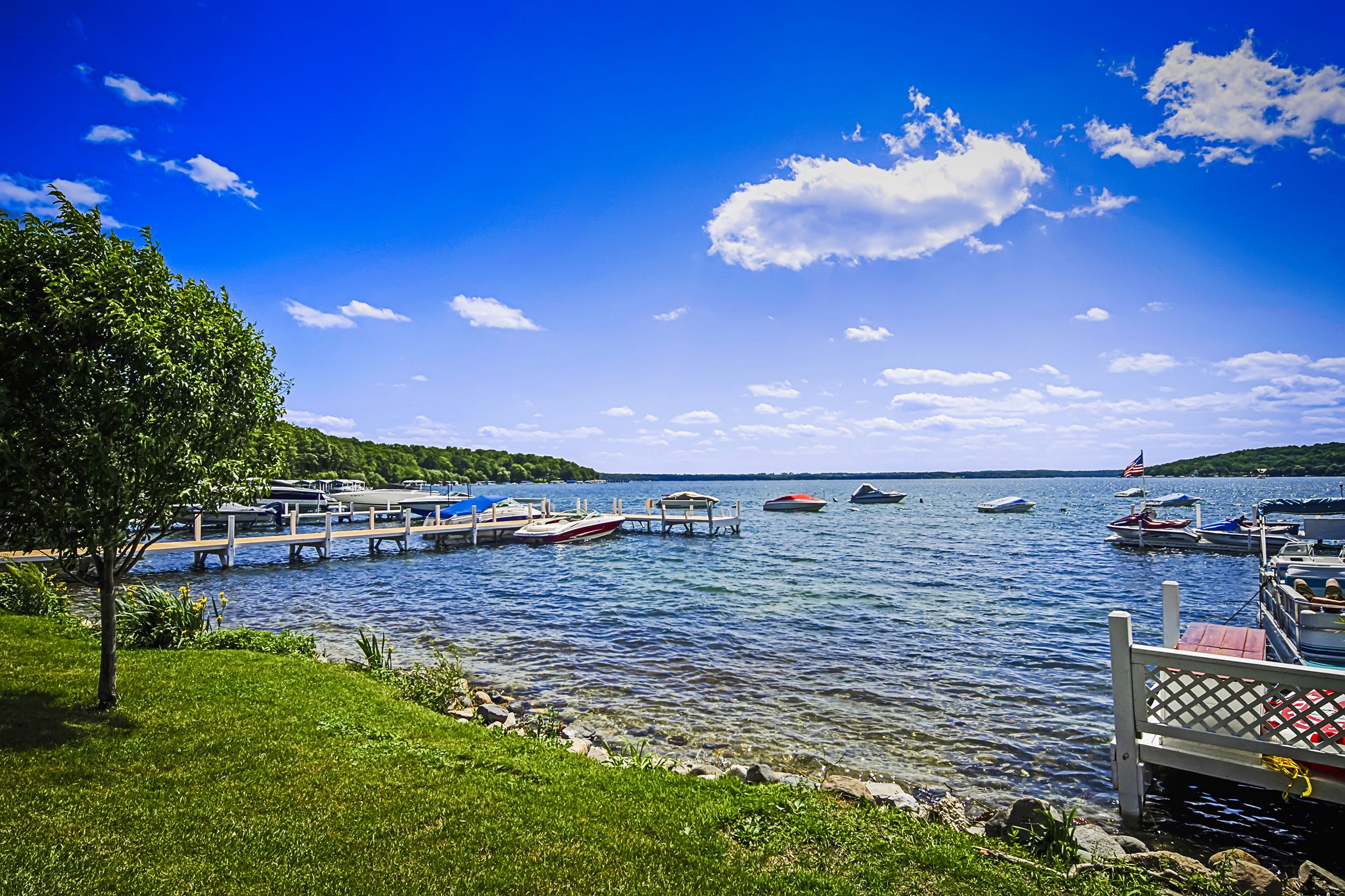 Lake Geneva, WI in summer with boats and a blue sky