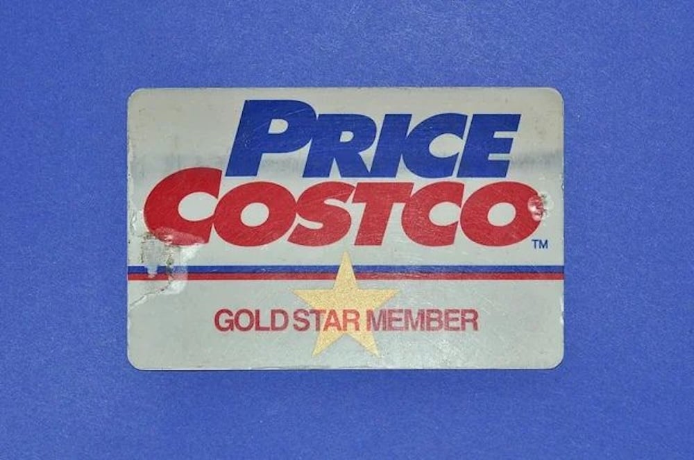 A vintage PriceCostco membership card on a blue background, labeled "Gold Star Member" with a gold star and red, white, and blue text.