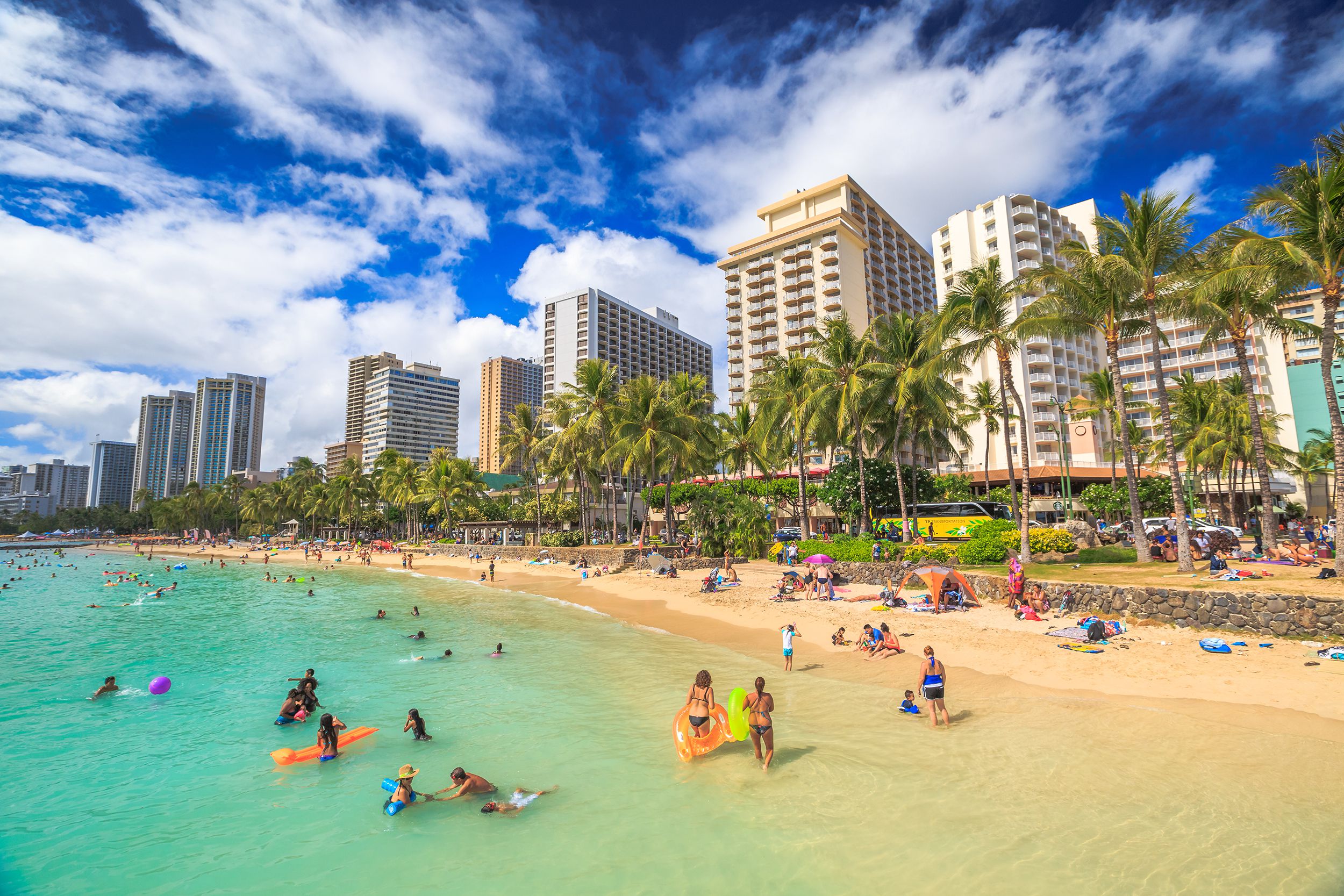 Crowded beach at Waikiki, HI
