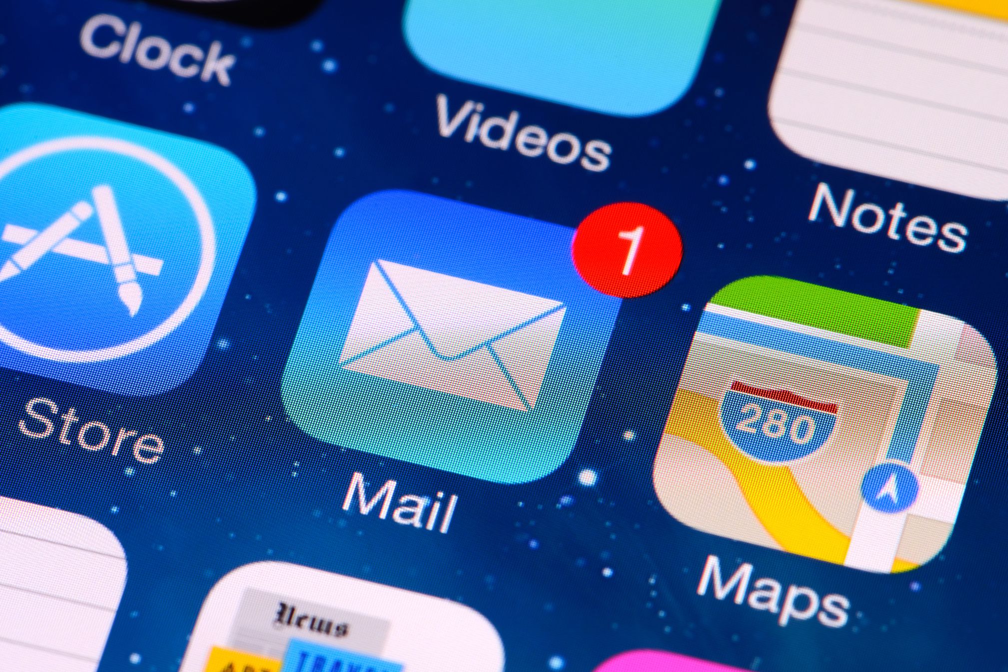 Close up shot of the applications of iPhone 5 screen with mail app