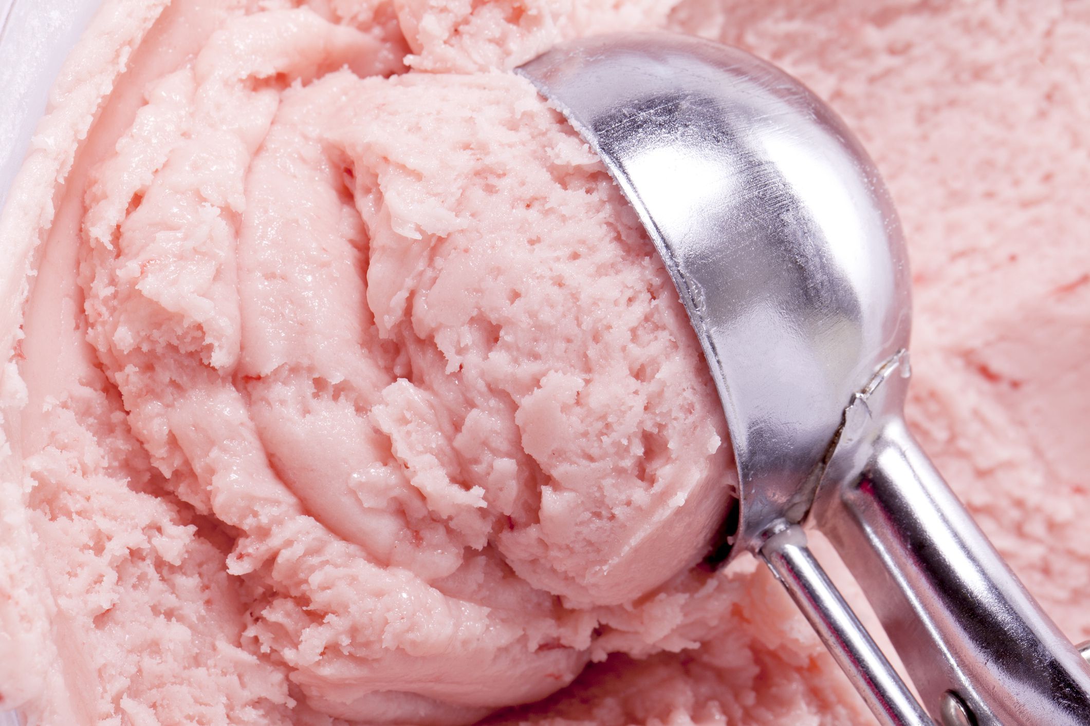 strawberry ice cream and scooper