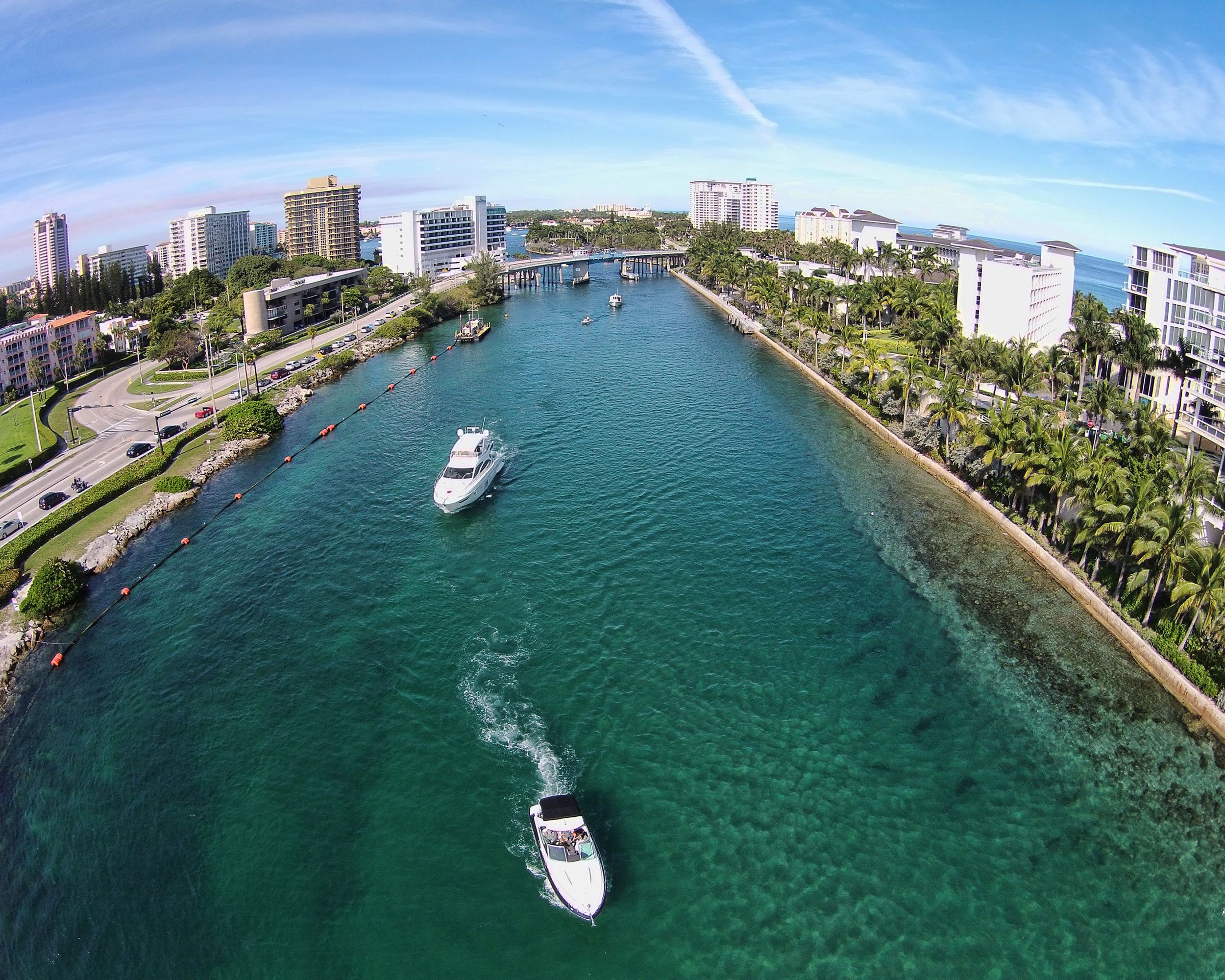 Aerial view of boating inlet in Boca Raton, Florida on a sunny day
