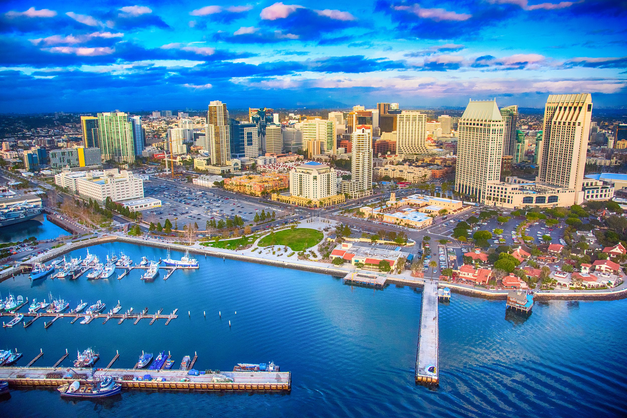 Aerial of downtown San Diego, California after a storm at early sunset