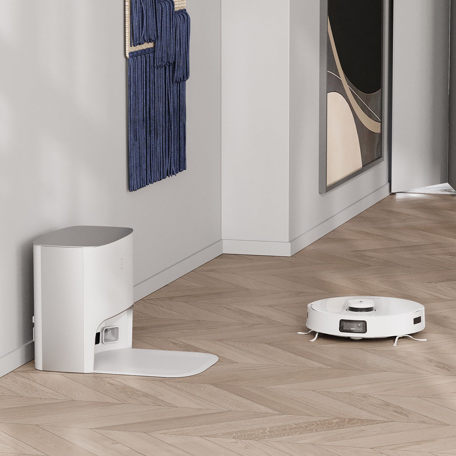 white robotic vacuum and mop