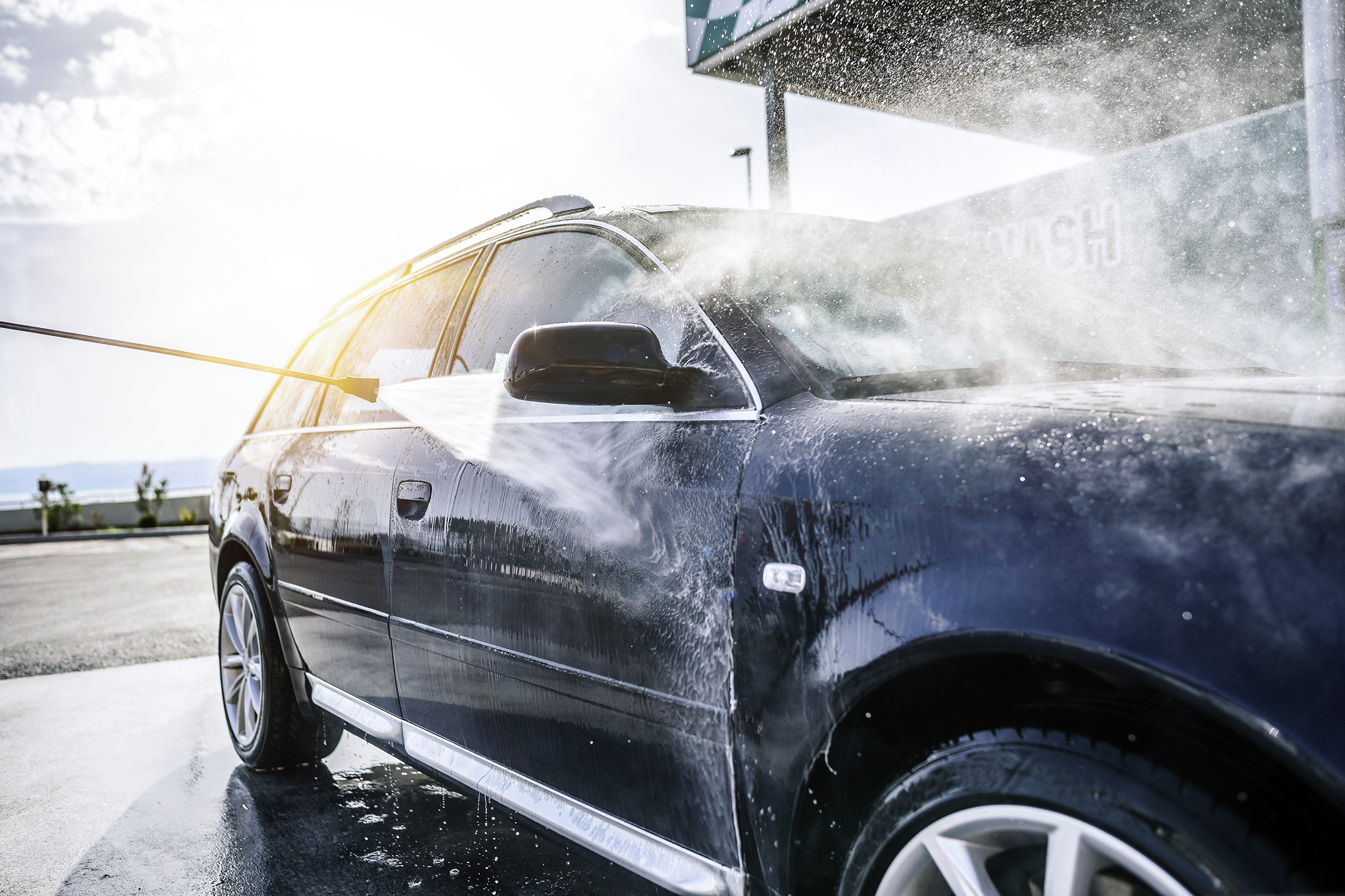 Car getting a power wash