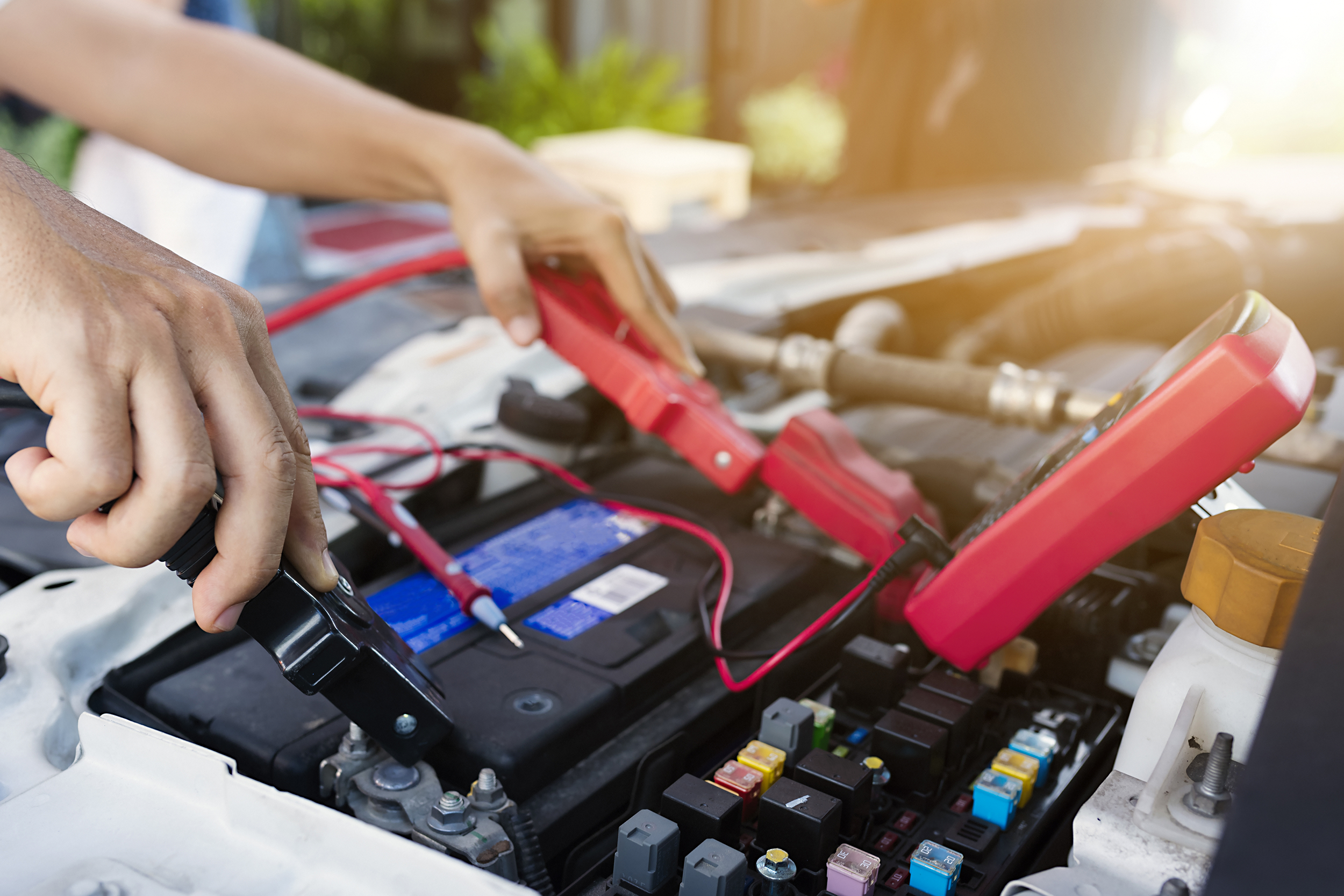 Using a jump starter kit to recharge a car battery