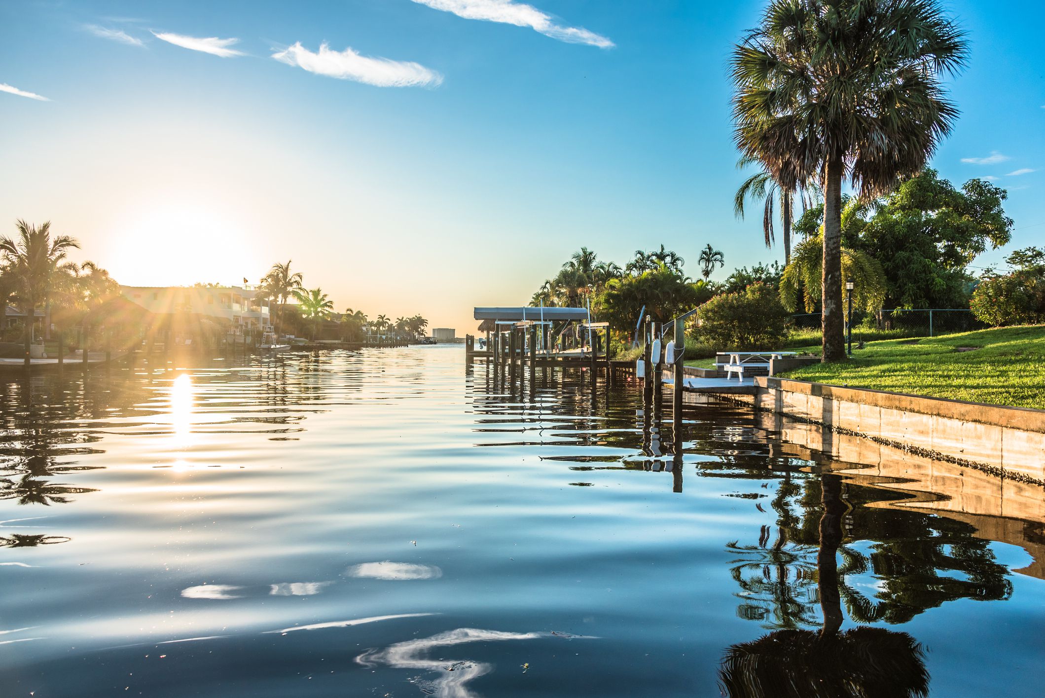 Sunrise over canal in Cape Coral, Florida with focus on water