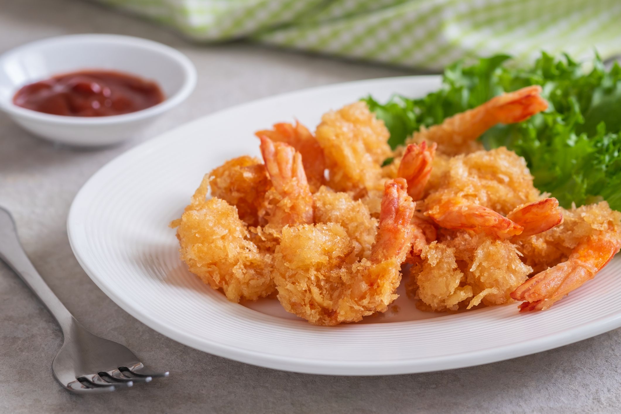 Fried shrimp and vegetable on plate