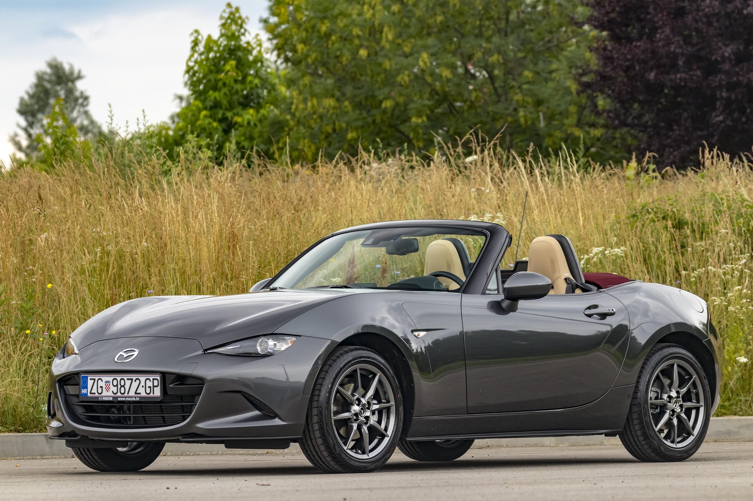 Zagreb, Croatia - April 22, 2018: Mazda MX-5 aka Miata stopped on the road. This iconic Japanese sports roadster became very popular in the eighties because it was affordable.