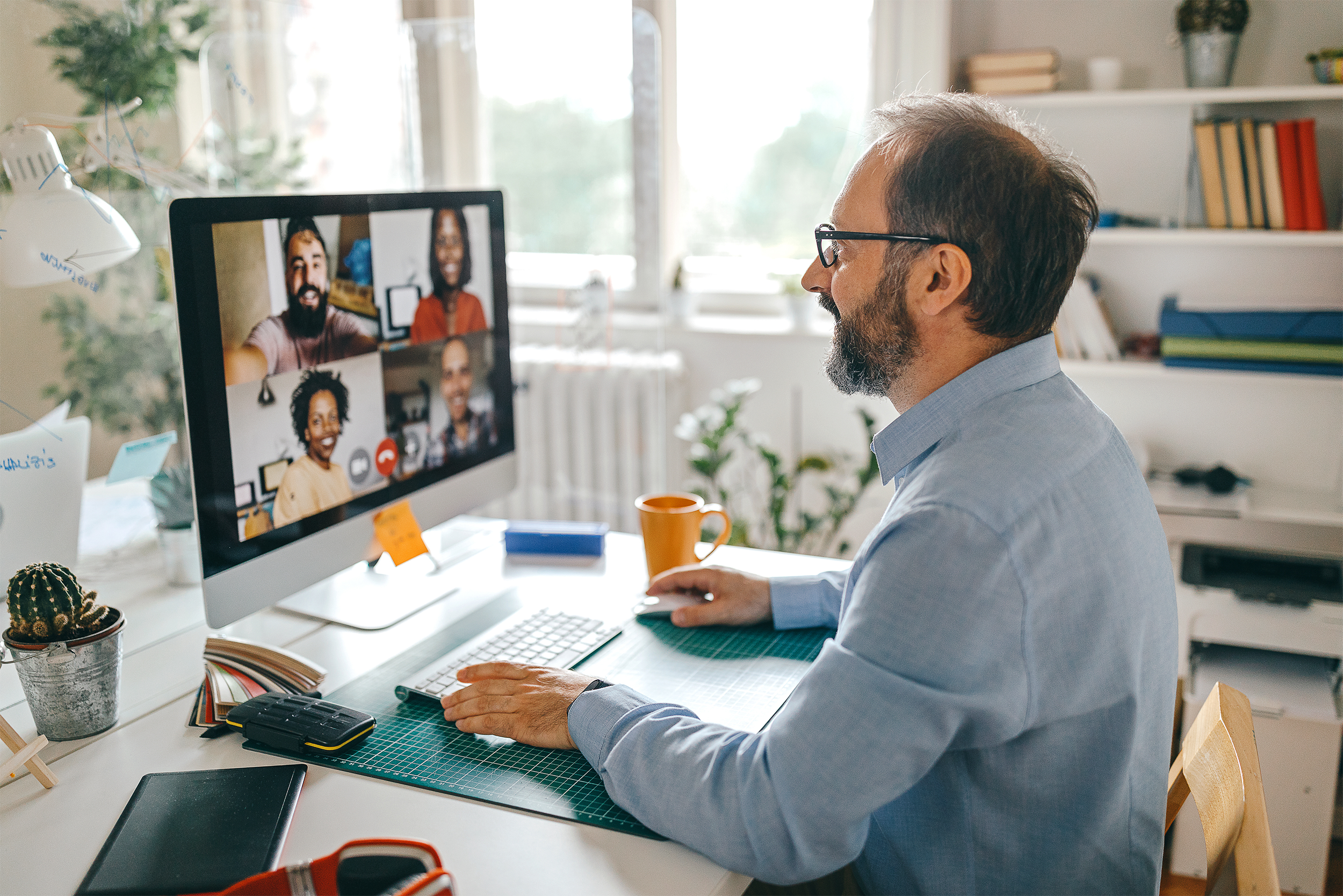 man on video call at home