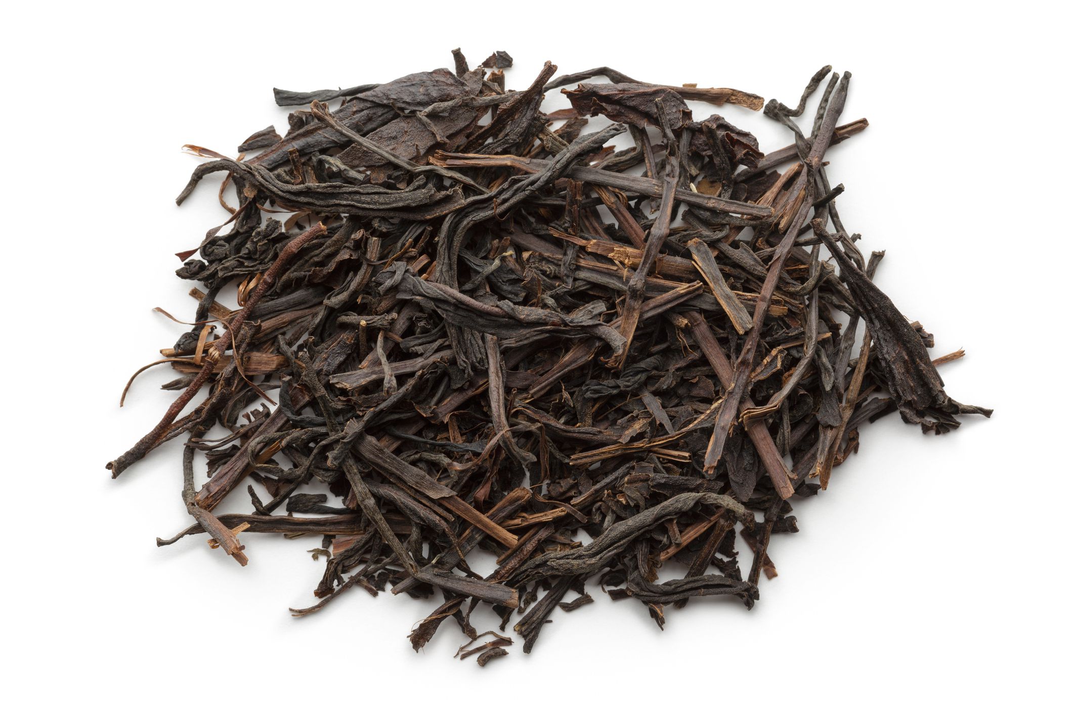 Black tea photographed on white background