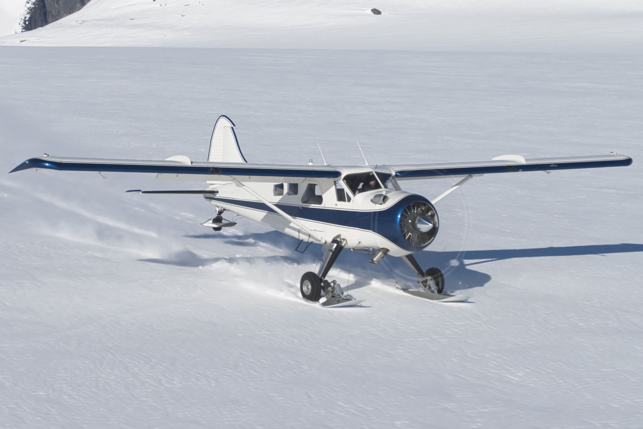 small plane landed in the snow