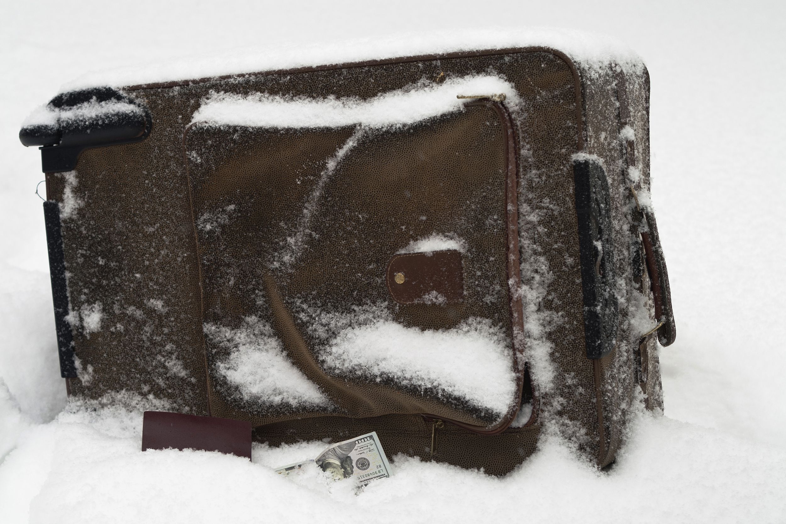 suitcase in snow