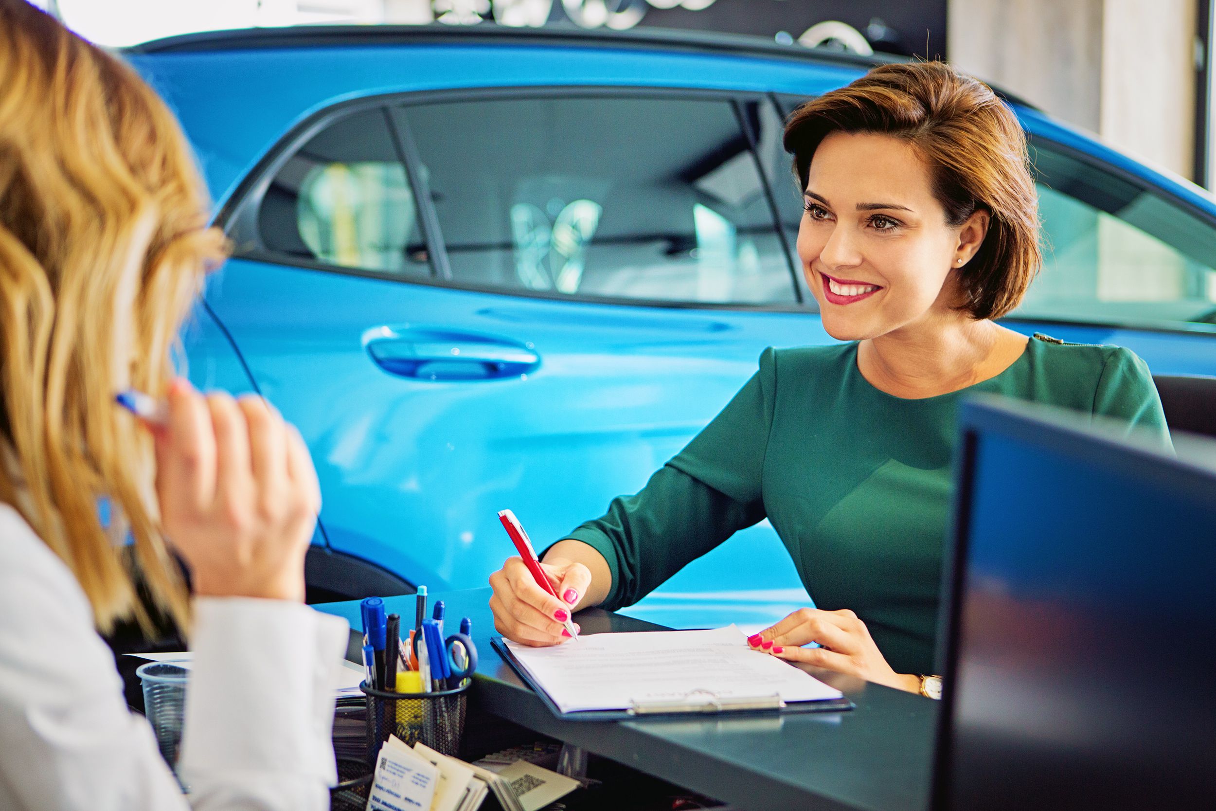 car dealer sales car to the customer
