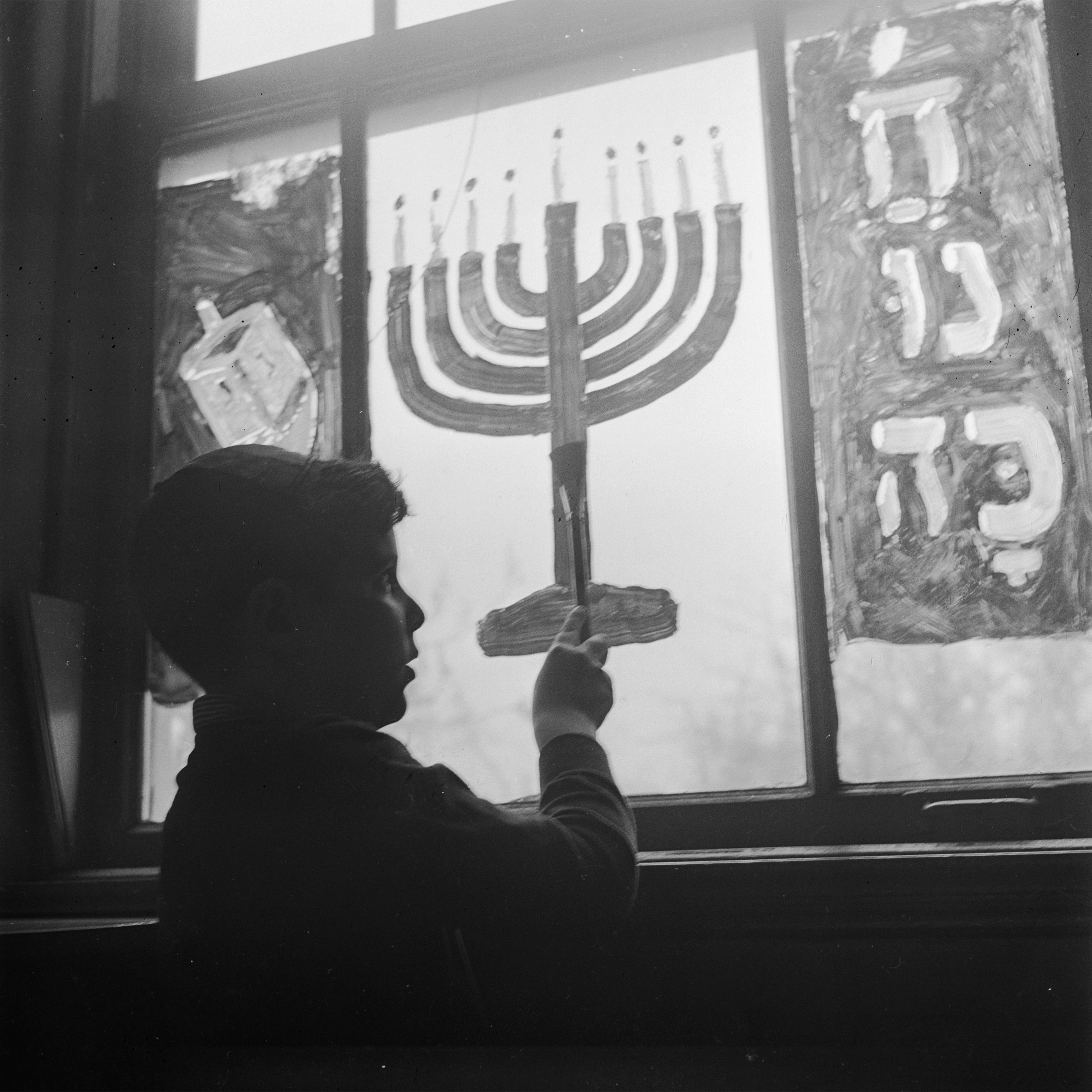 A Chanukkah window is decorated at the Hebrew Institute of Far Rockaway
