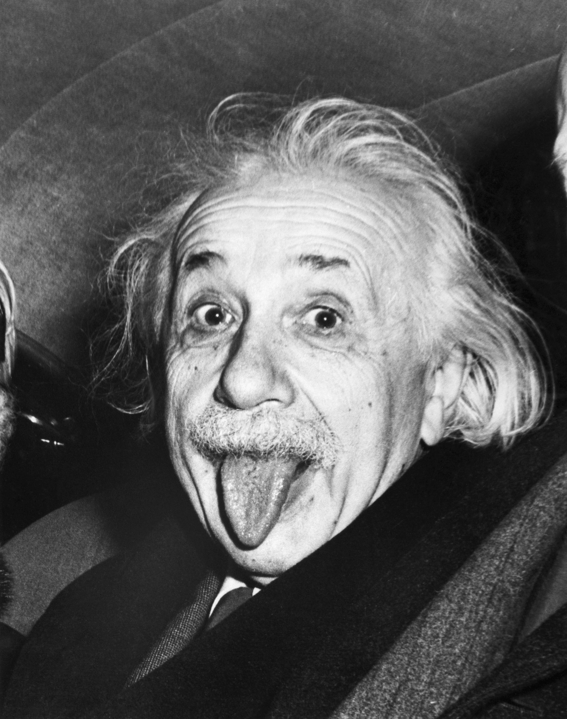 Iconic Albert Einstein sticking out his tongue photo, 1951, black and white