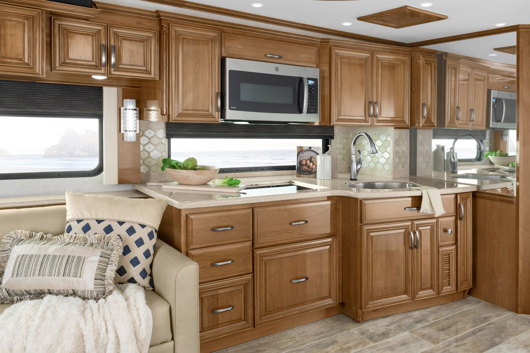 Interior of Newmar Essex, kitchen with wooden cabinets