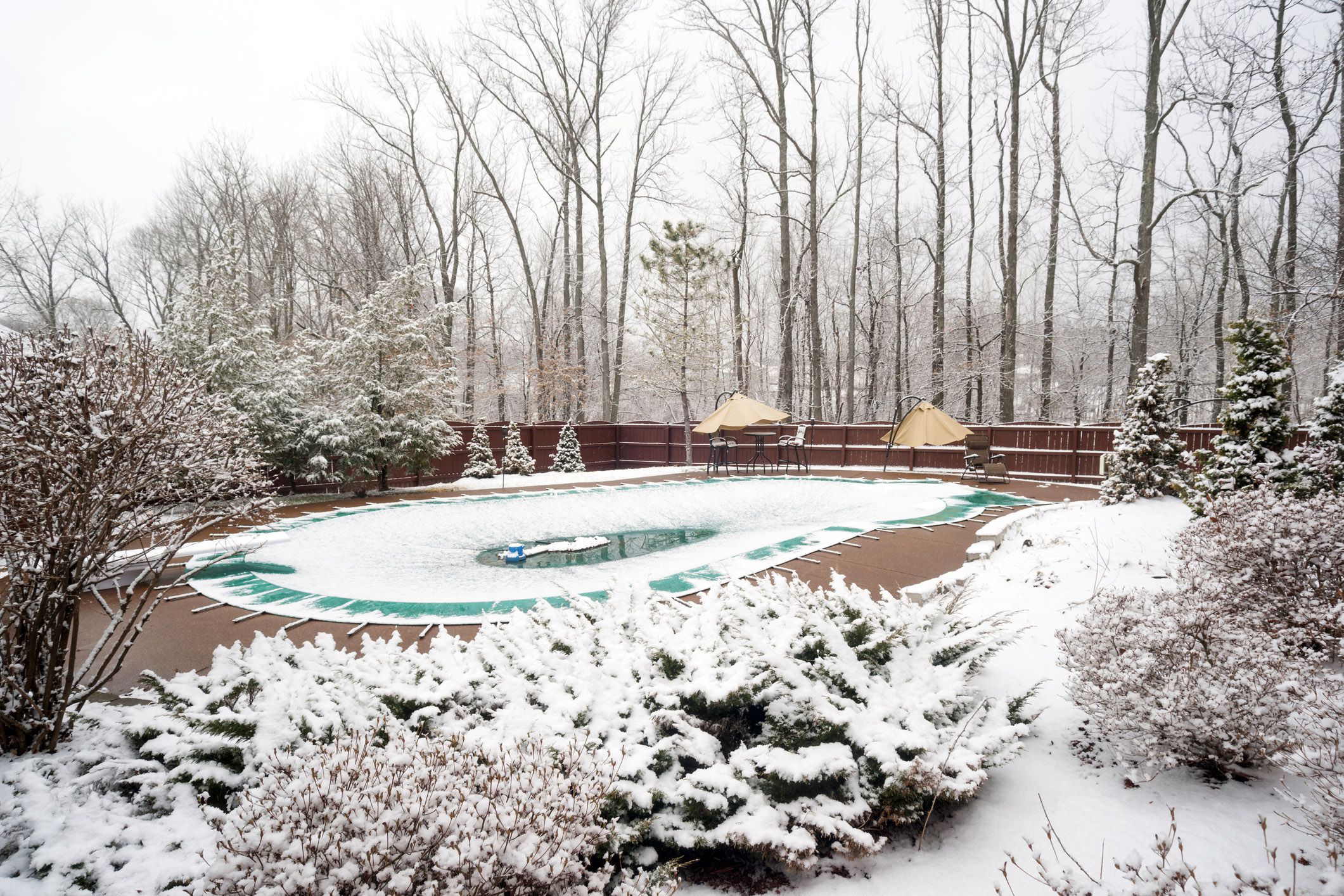covered pool with snow